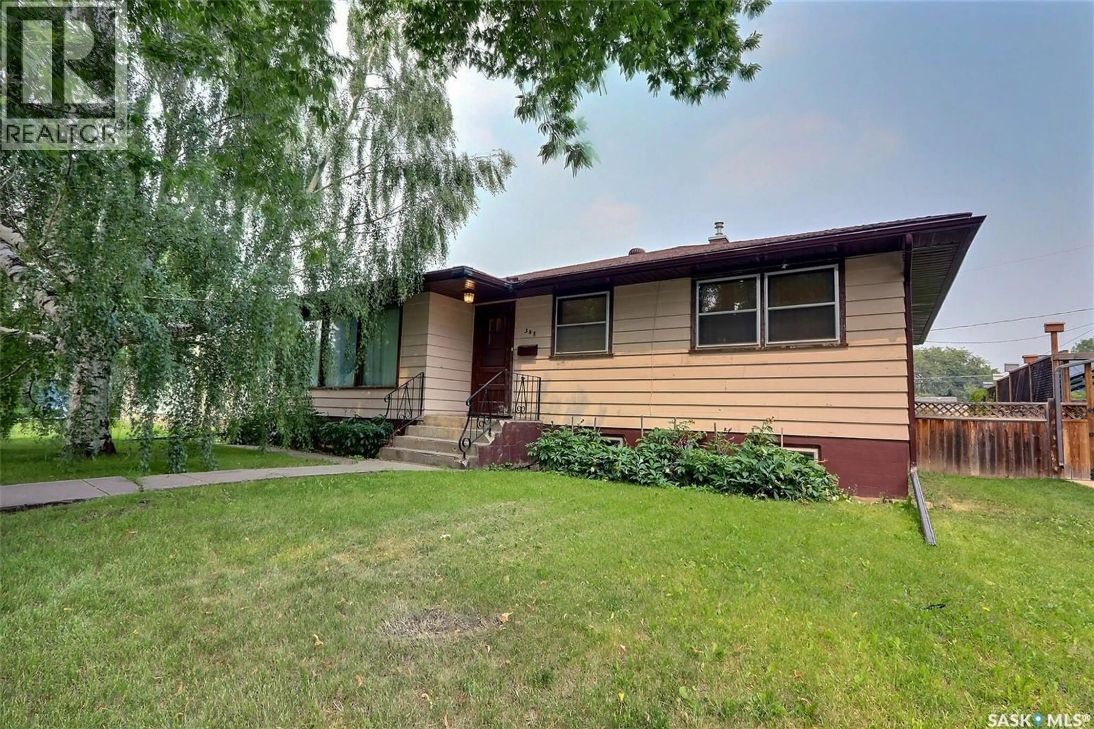 Home with vinyl exterior material, street for 348 22ND STREET, Prince Albert Saskatchewan S6V4K4