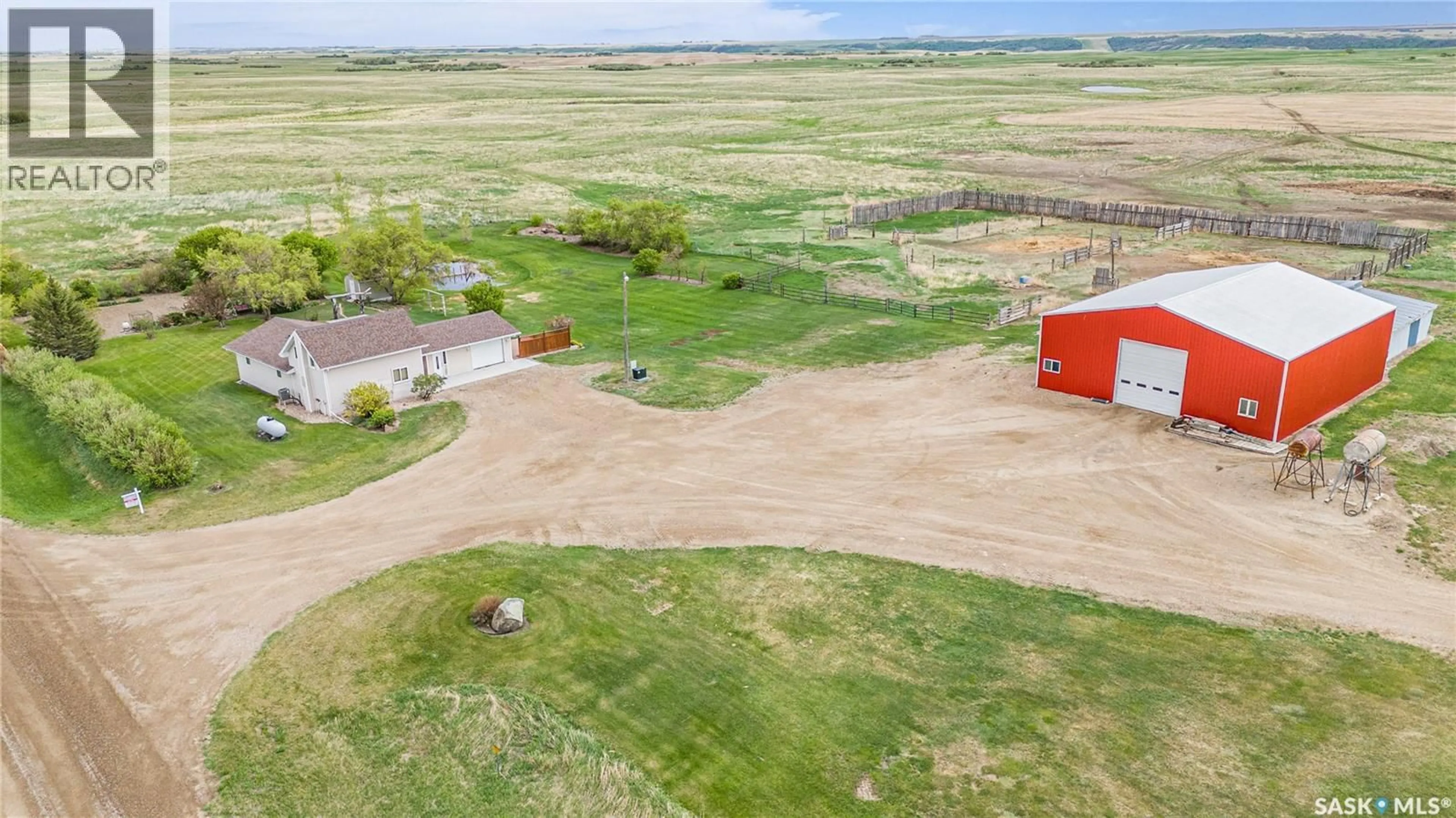 A pic from outside/outdoor area/front of a property/back of a property/a pic from drone, water/lake/river/ocean view for MOUNTENAY ACREAGE, Dufferin Rm No. 190 Saskatchewan S0G0H0