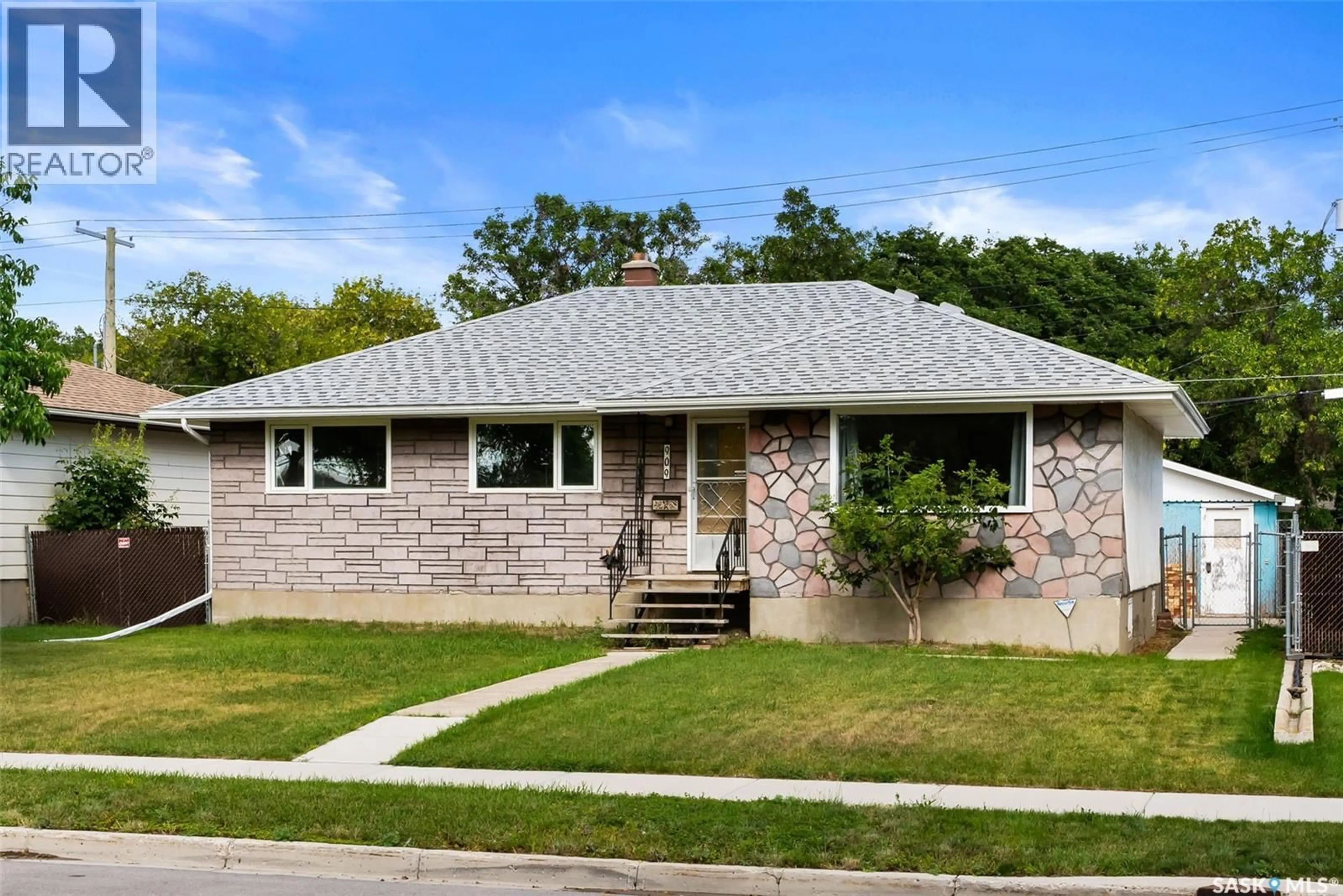 Home with brick exterior material, street for 909 CAMPBELL STREET, Regina Saskatchewan S4T5P2
