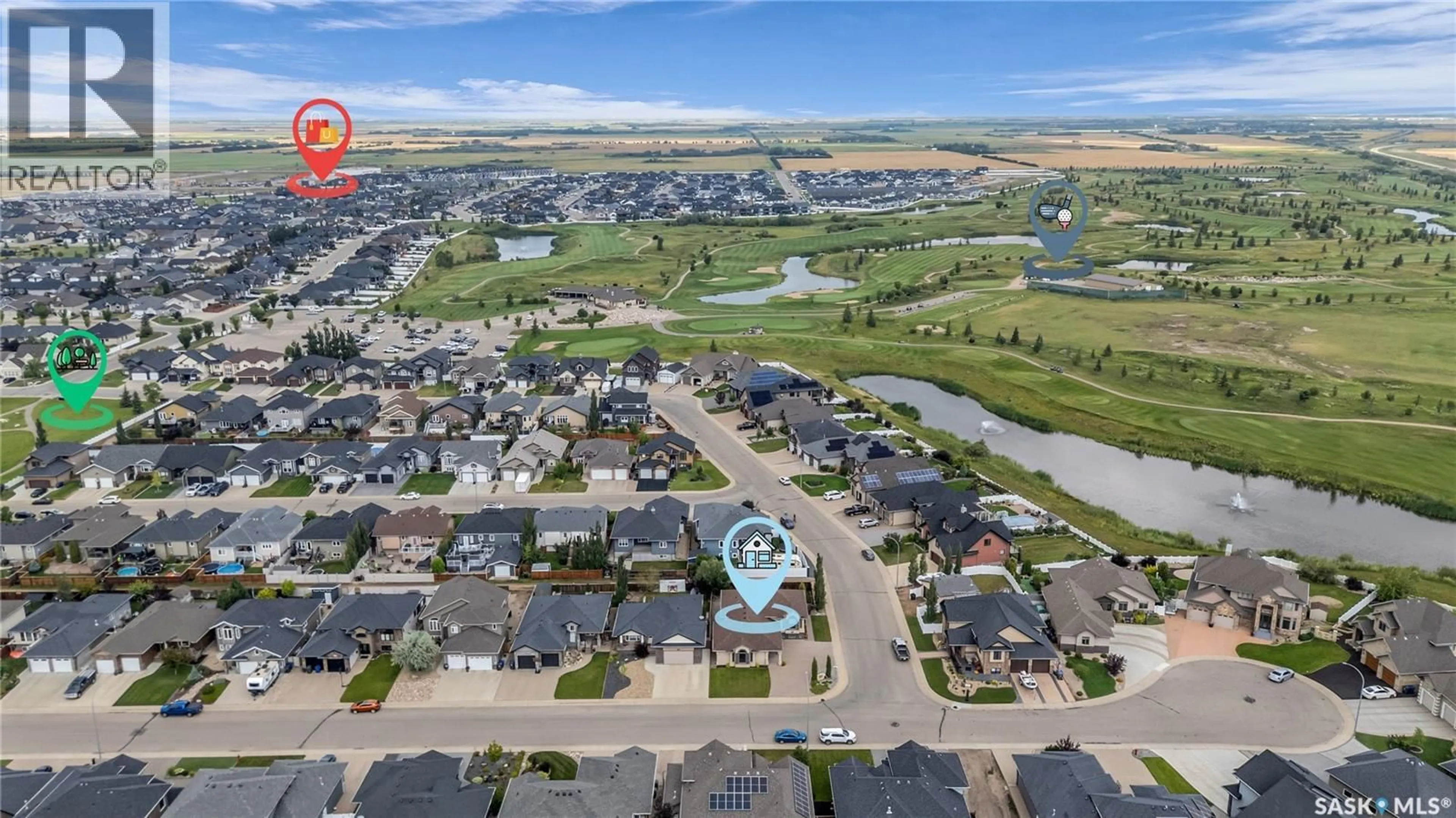 A pic from outside/outdoor area/front of a property/back of a property/a pic from drone, water/lake/river/ocean view for 424 HOGAN WAY, Warman Saskatchewan S0K4S1