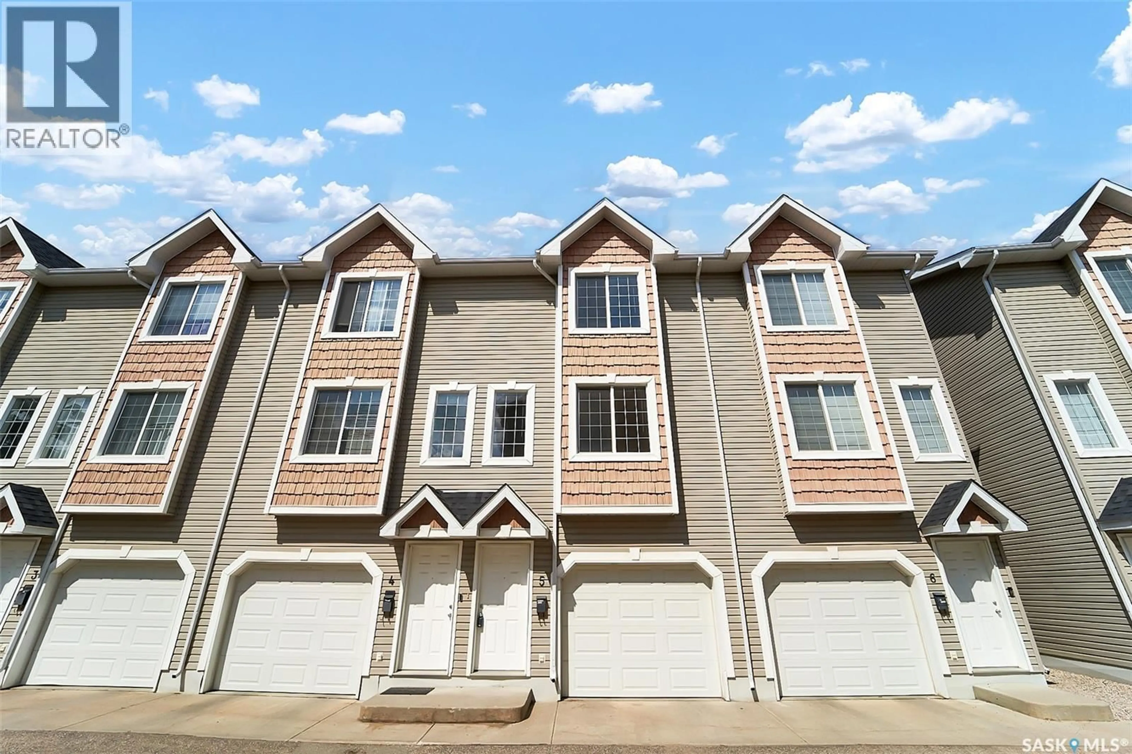 Home with vinyl exterior material, street for 5 302 HEROLD ROAD, Saskatoon Saskatchewan S7V1J3