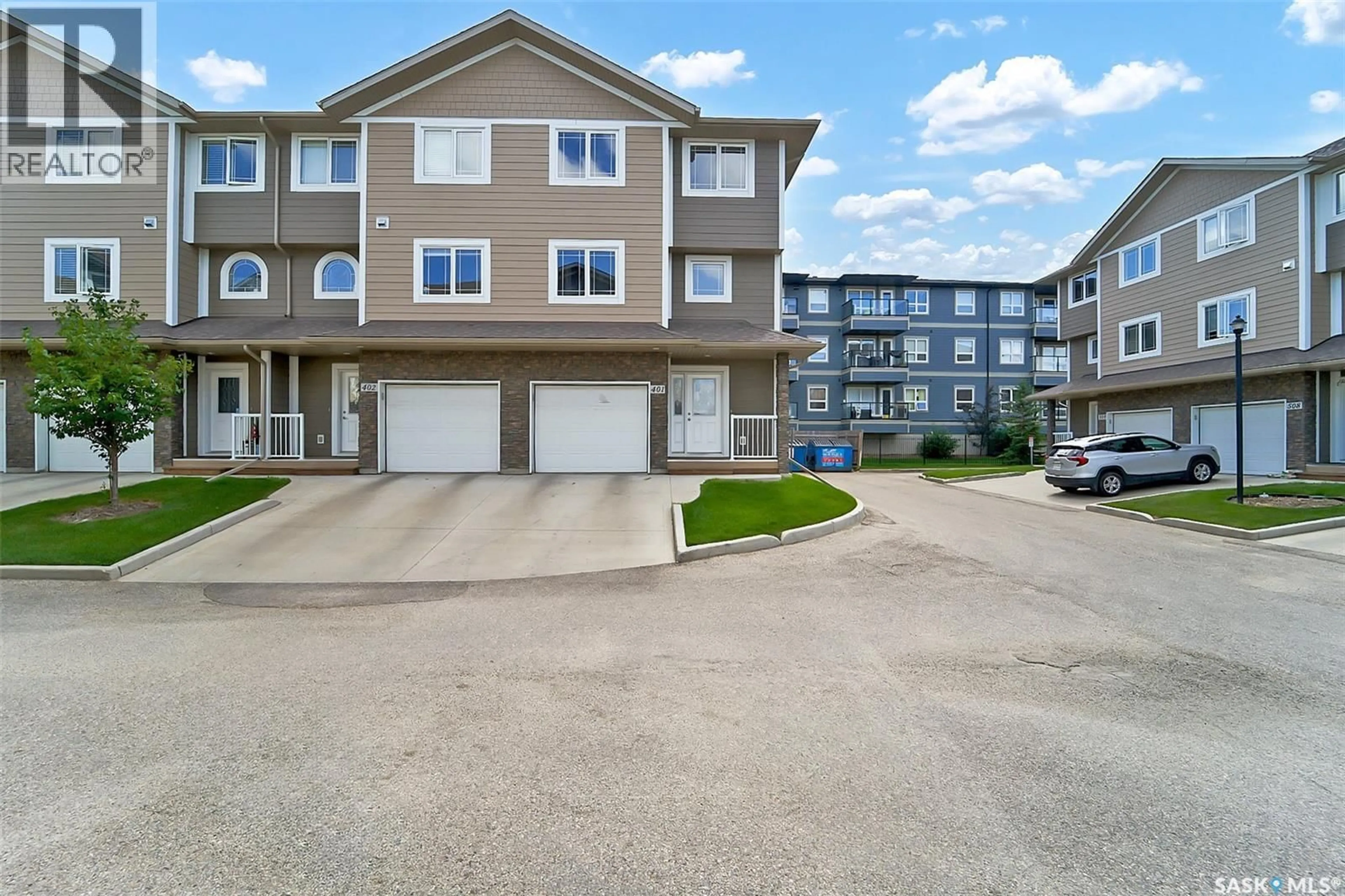 A pic from outside/outdoor area/front of a property/back of a property/a pic from drone, street for 401 212 WILLIS CRESCENT, Saskatoon Saskatchewan S7T0R7