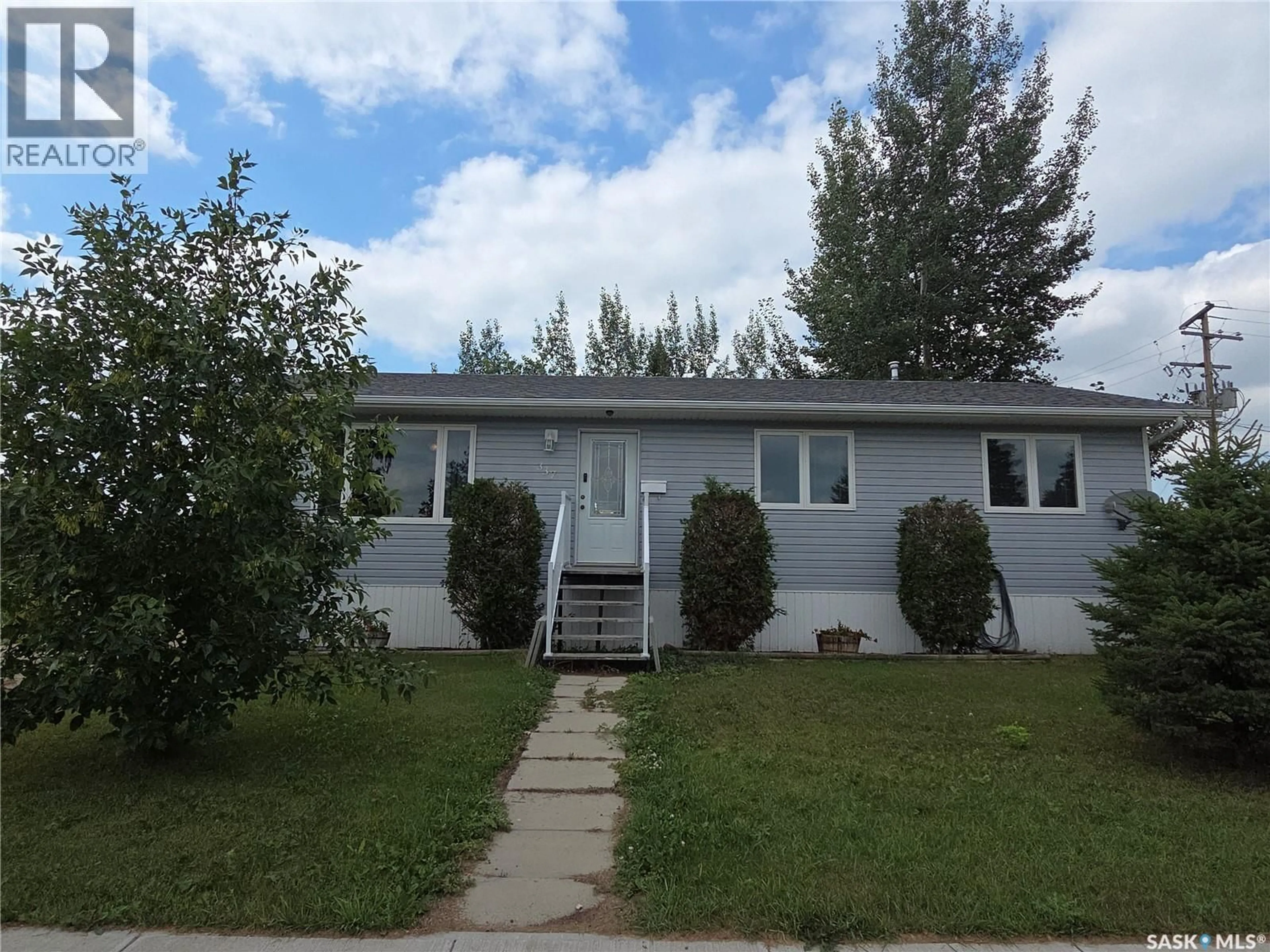 Home with vinyl exterior material, street for 337 MAIN STREET, Allan Saskatchewan S0K0C0
