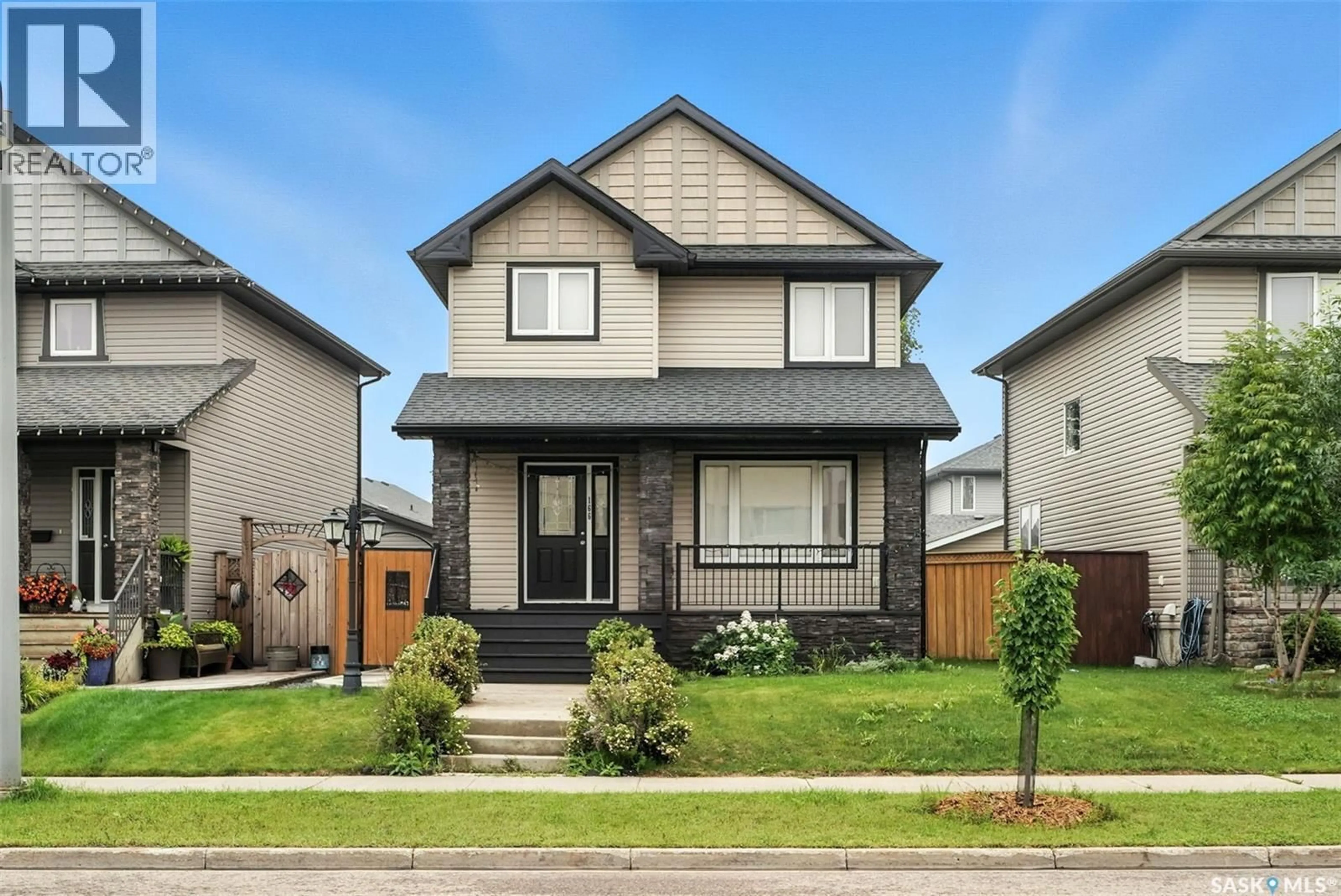 Home with vinyl exterior material, street for 166 CORNISH ROAD, Saskatoon Saskatchewan S7T0K4