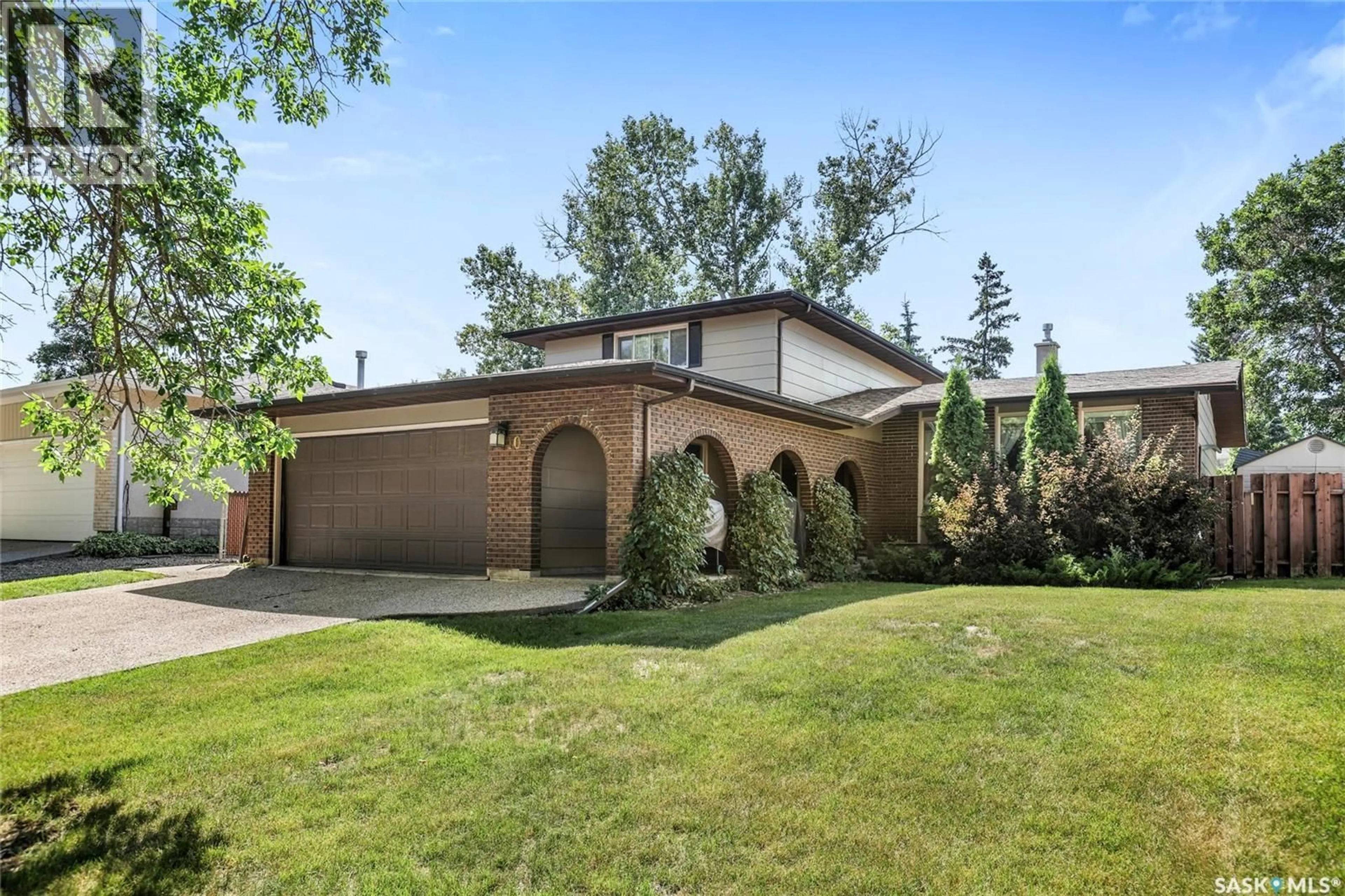 Home with brick exterior material, street for 10 SELKIRK CRESCENT, Regina Saskatchewan S4S6J4