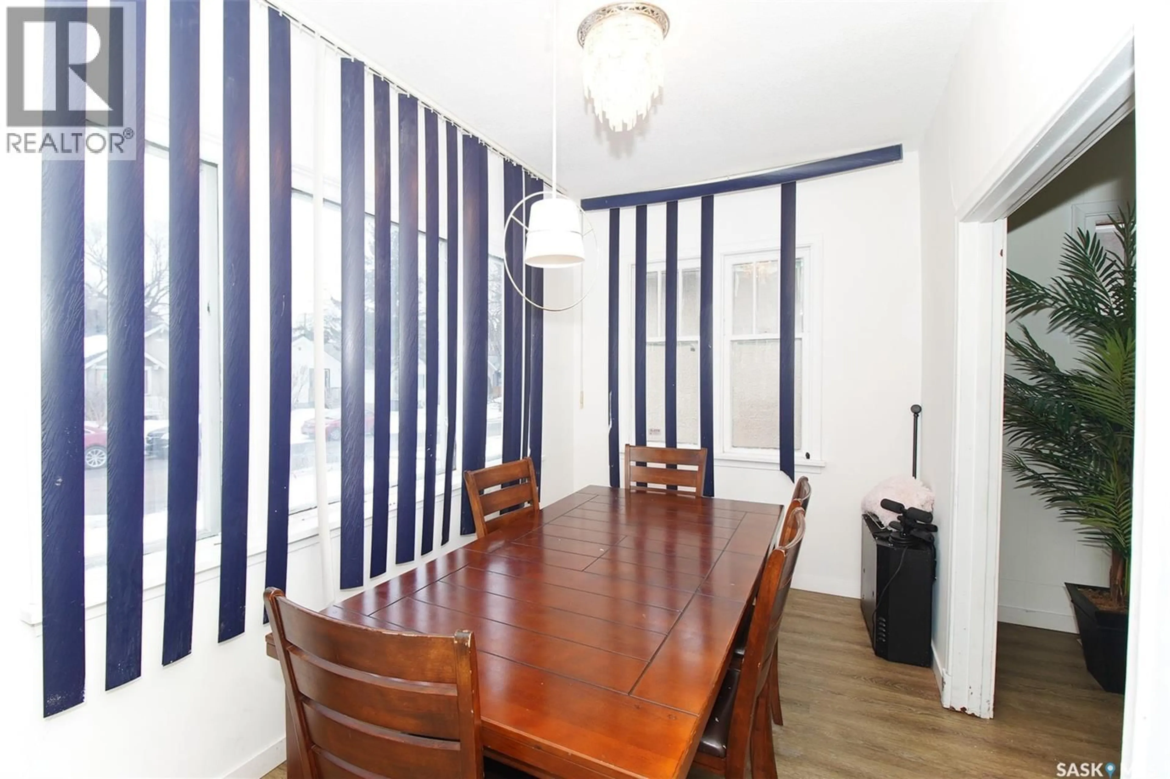 Dining room, wood/laminate floor for 1428 QUEEN STREET, Regina Saskatchewan S4T4B8