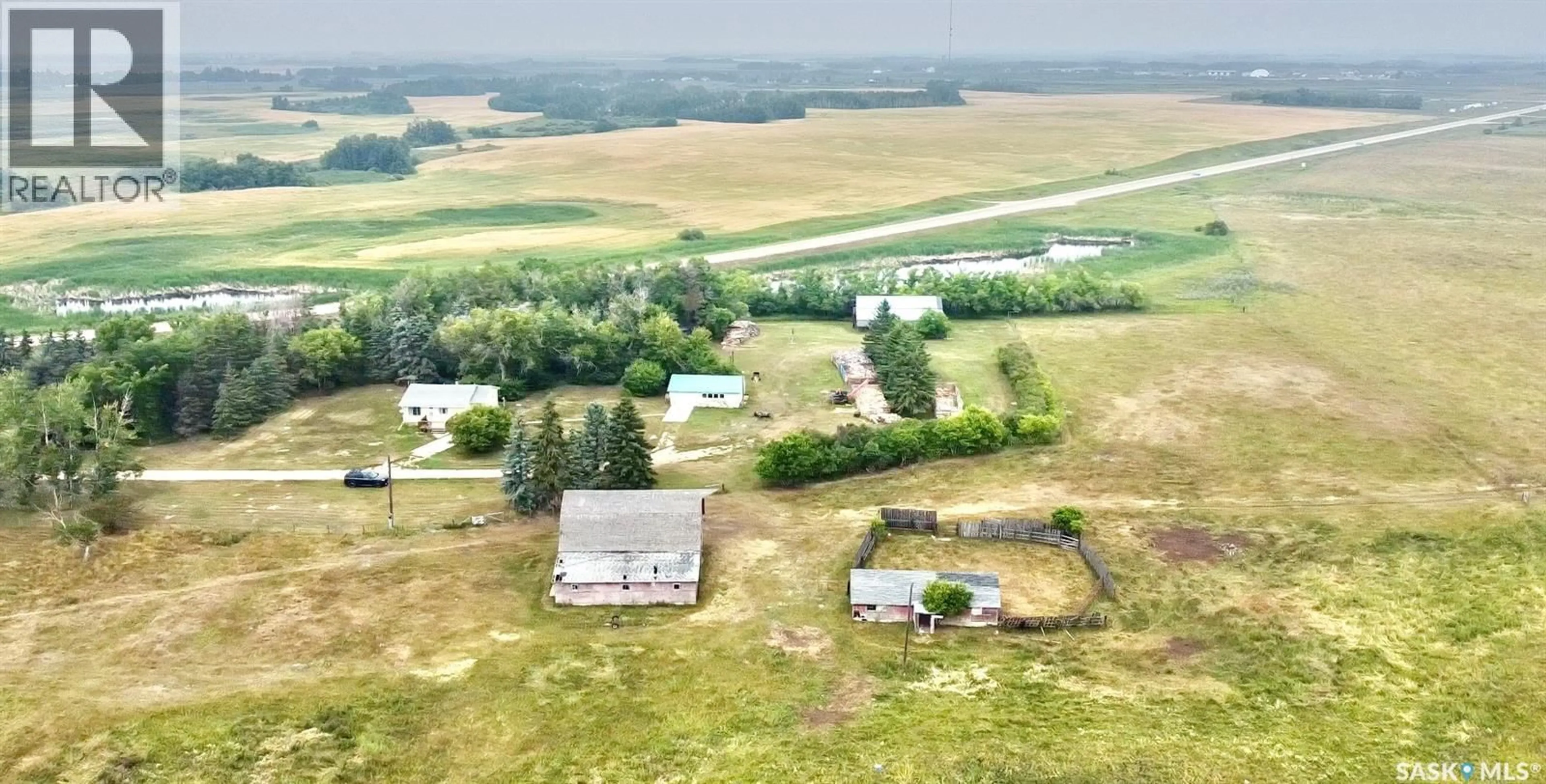 A pic from outside/outdoor area/front of a property/back of a property/a pic from drone, building for MELVILLE ACREAGE, Melville Saskatchewan S0A2P0