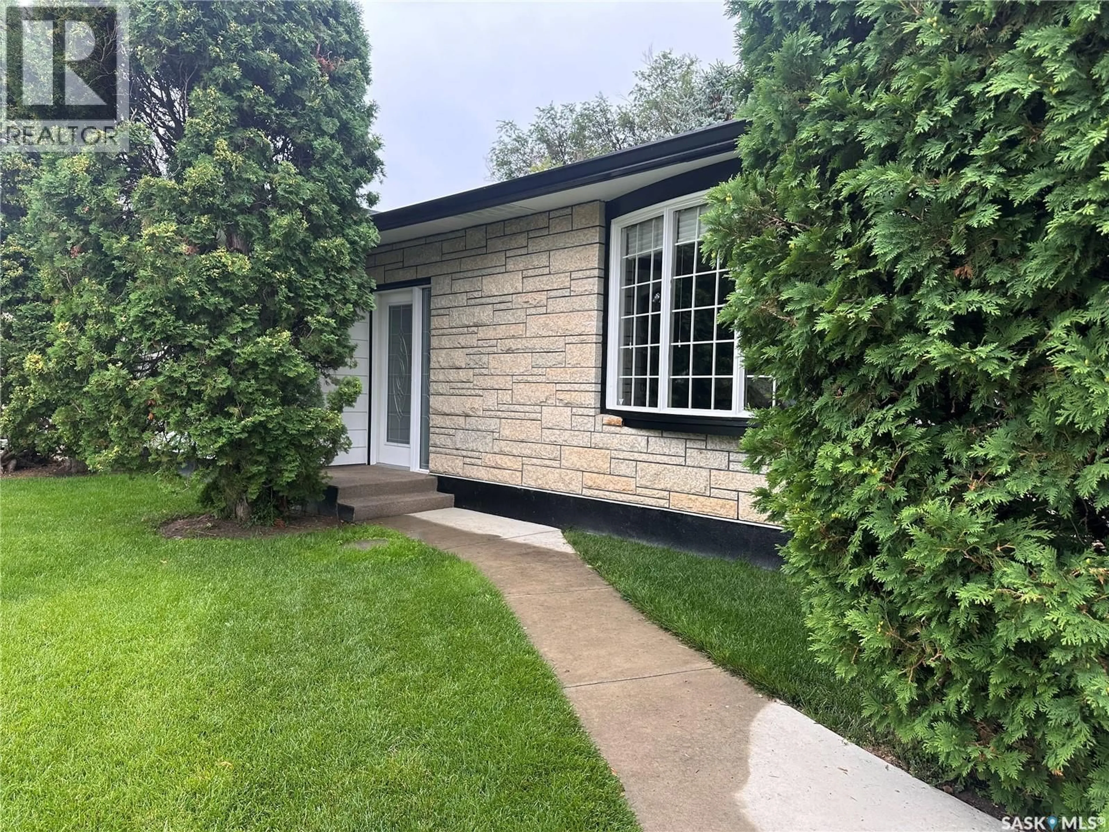 Home with brick exterior material, street for 1341 KING CRESCENT, Moose Jaw Saskatchewan S6H3G3