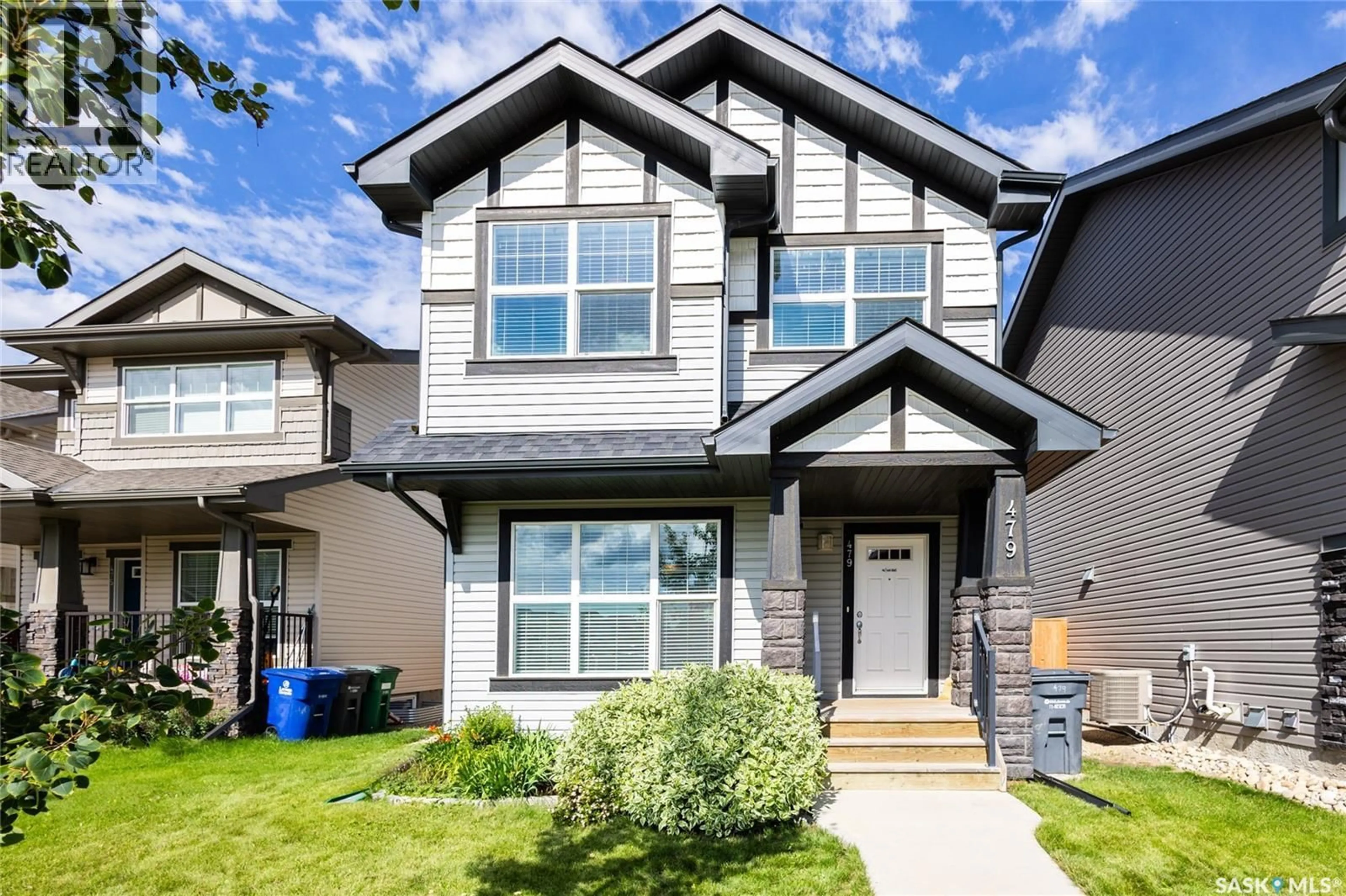 Home with vinyl exterior material, street for 479 SECORD WAY, Saskatoon Saskatchewan S7V0N9