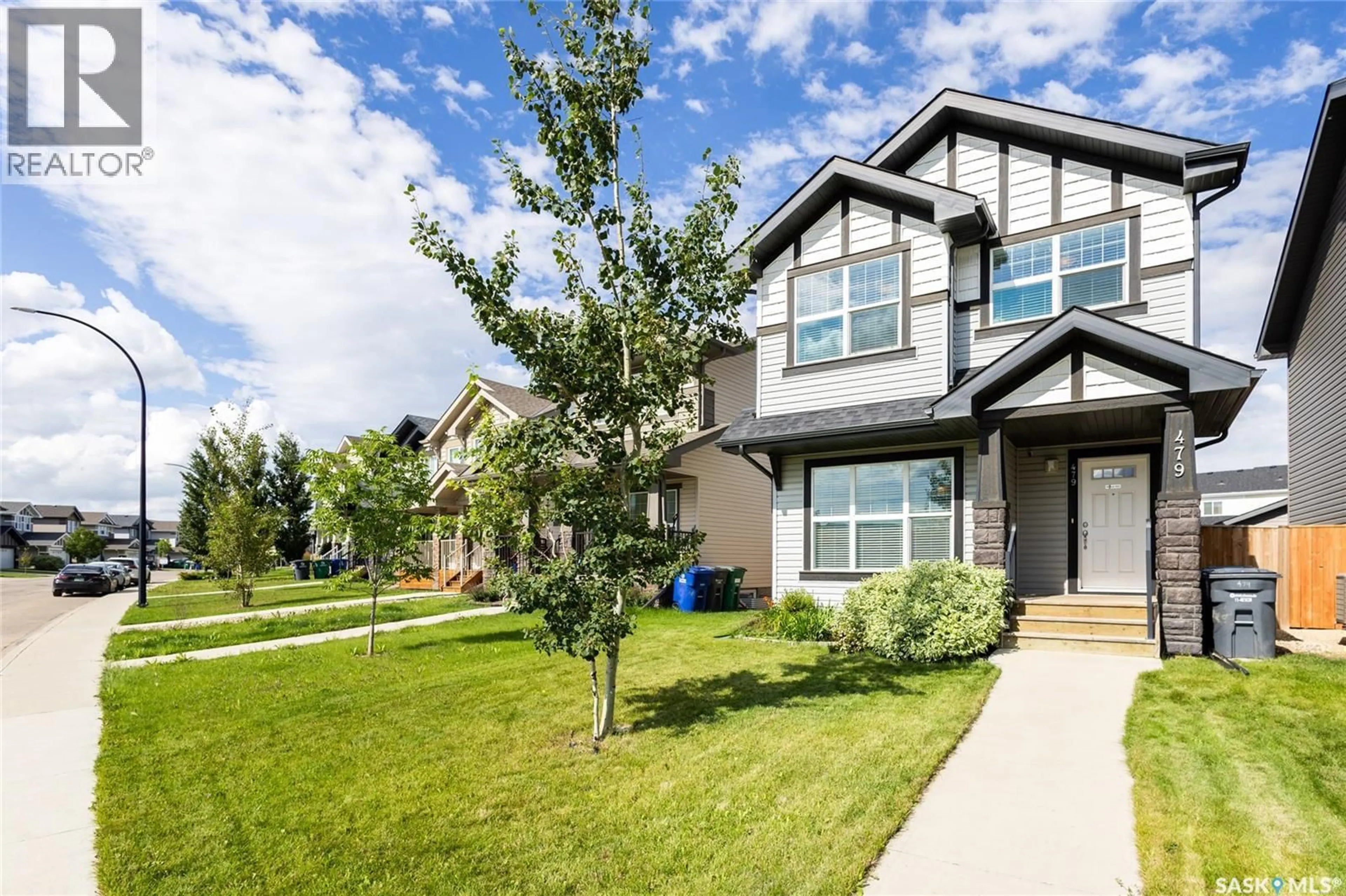 Home with vinyl exterior material, street for 479 SECORD WAY, Saskatoon Saskatchewan S7V0N9