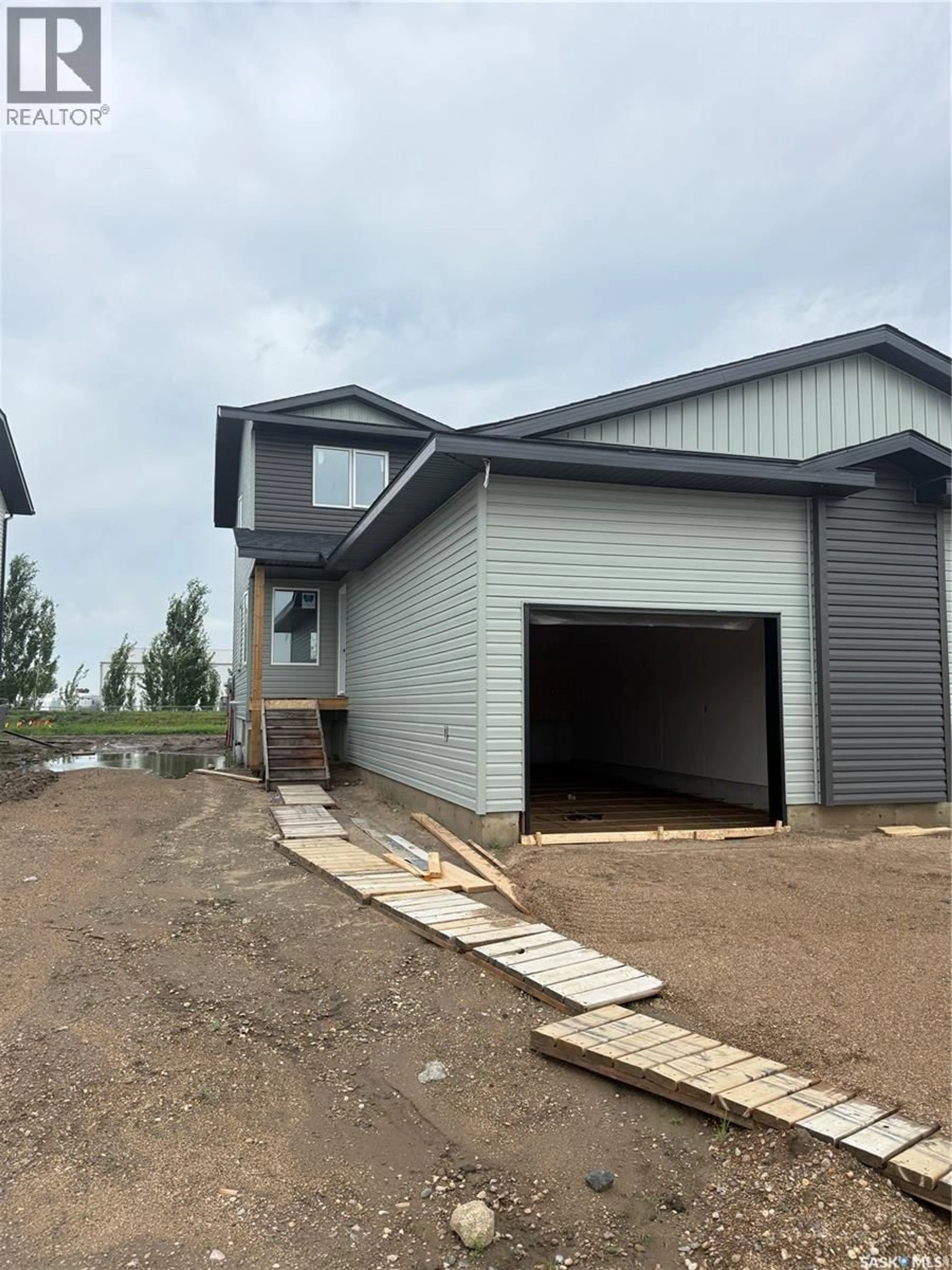 Home with vinyl exterior material, building for 238 FROESE CRESCENT, Warman Saskatchewan S0K4S0