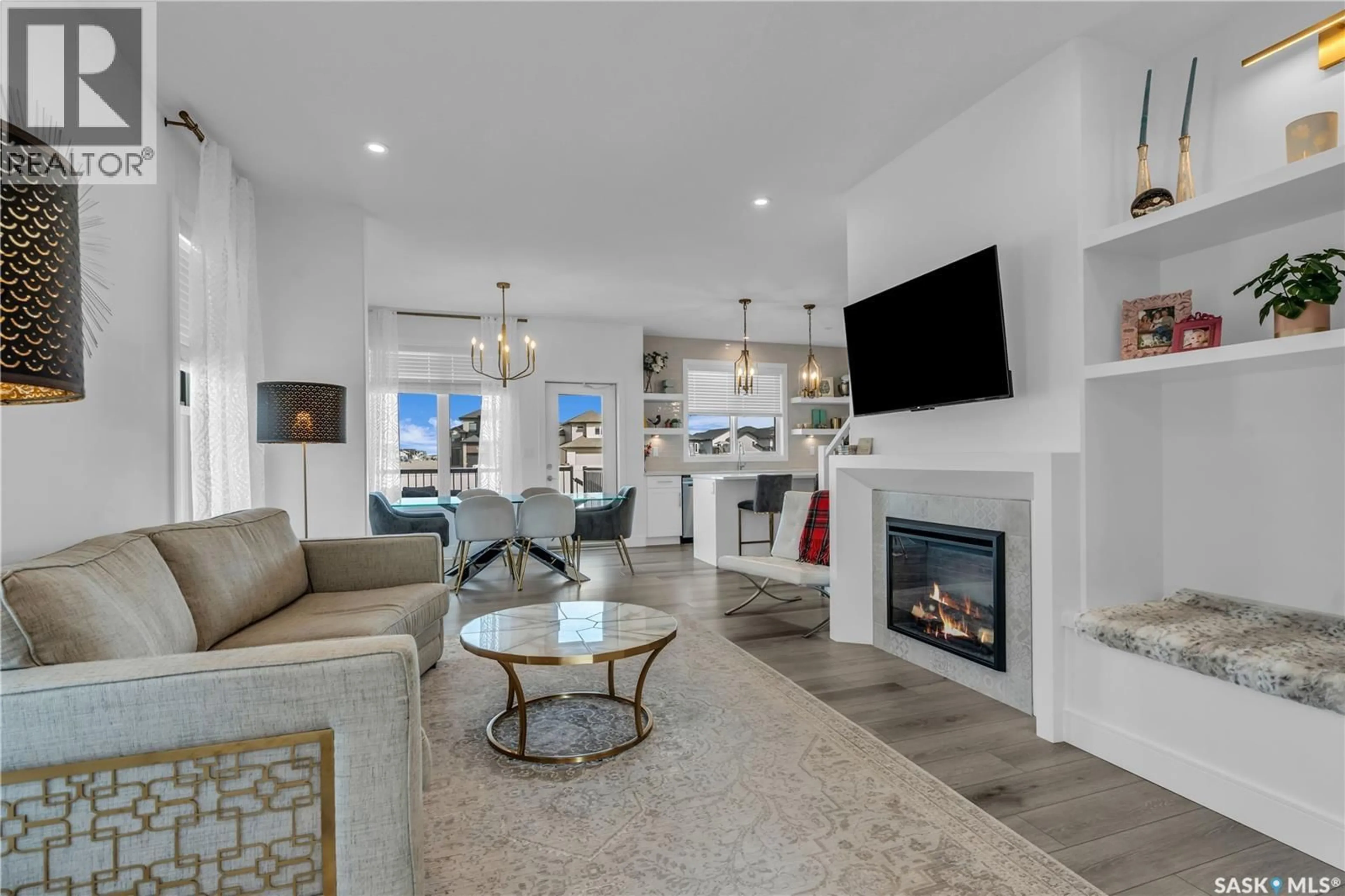 Living room with furniture, ceramic/tile floor for 574 BURGESS CRESCENT, Saskatoon Saskatchewan S7V0W6