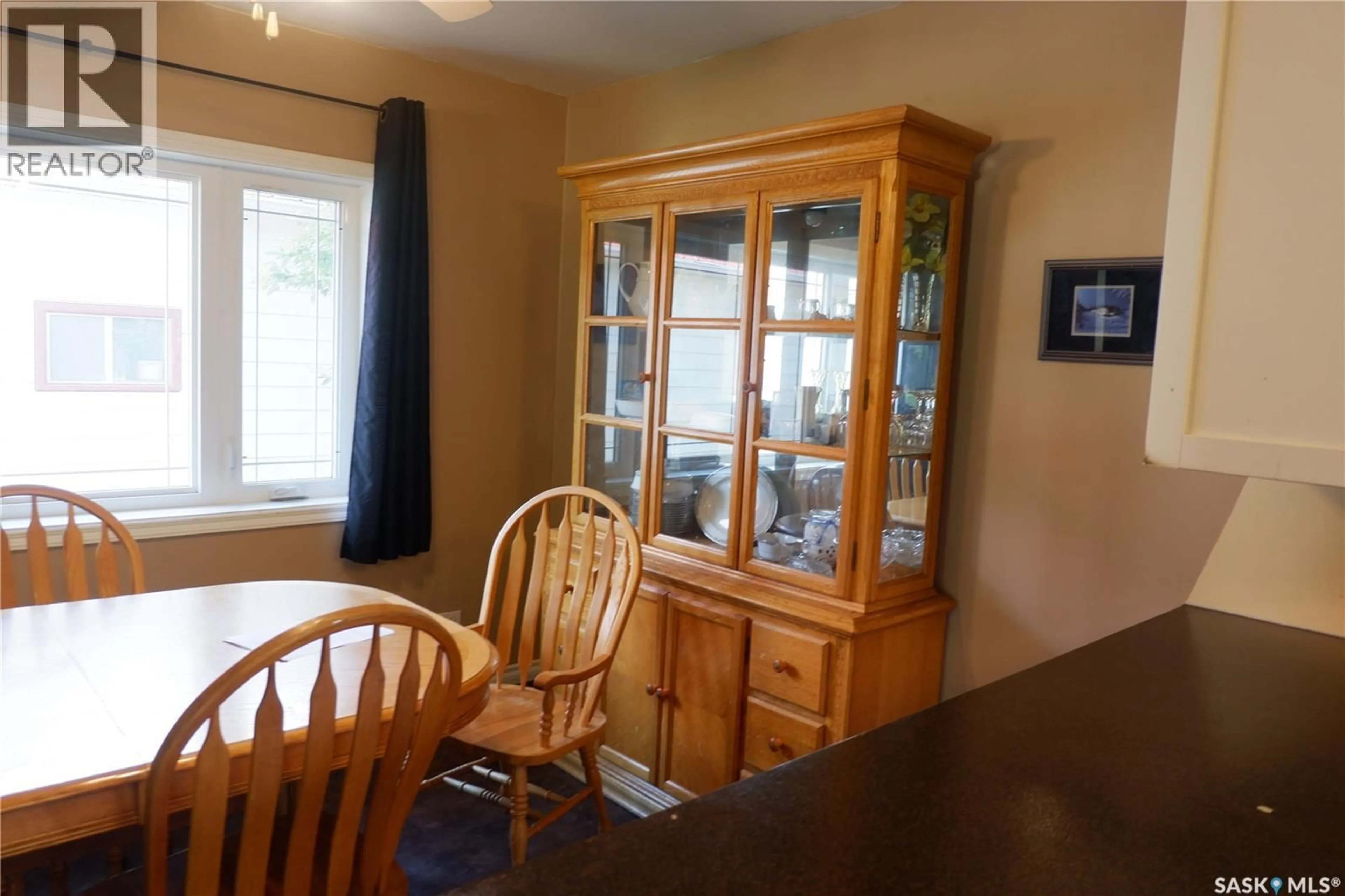 Dining room, wood/laminate floor for 314 COLUMBUS DRIVE, Rockglen Saskatchewan S0H3R0