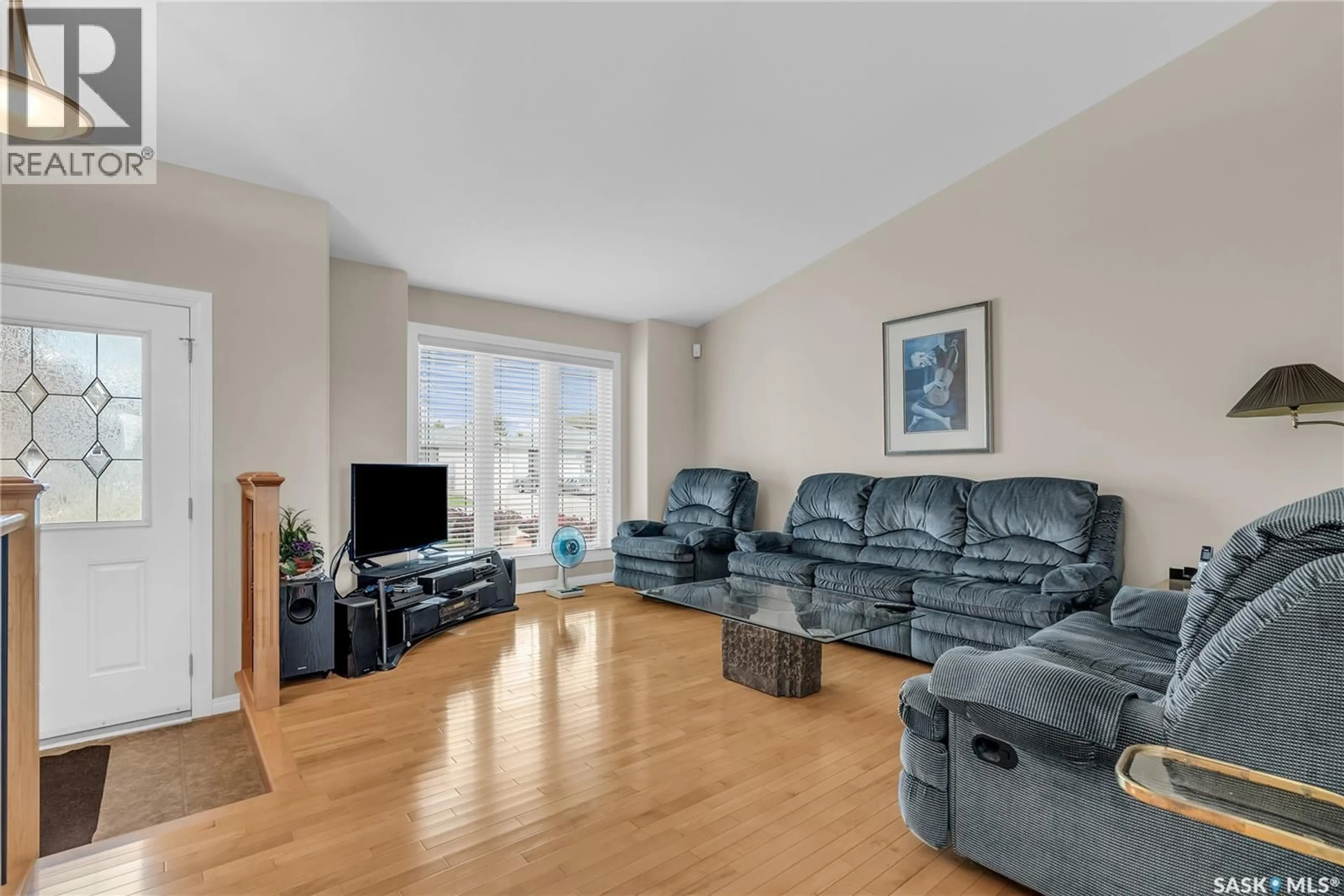 Living room with furniture, unknown for 1303 HUGHES DRIVE, Saskatoon Saskatchewan S7L7N1