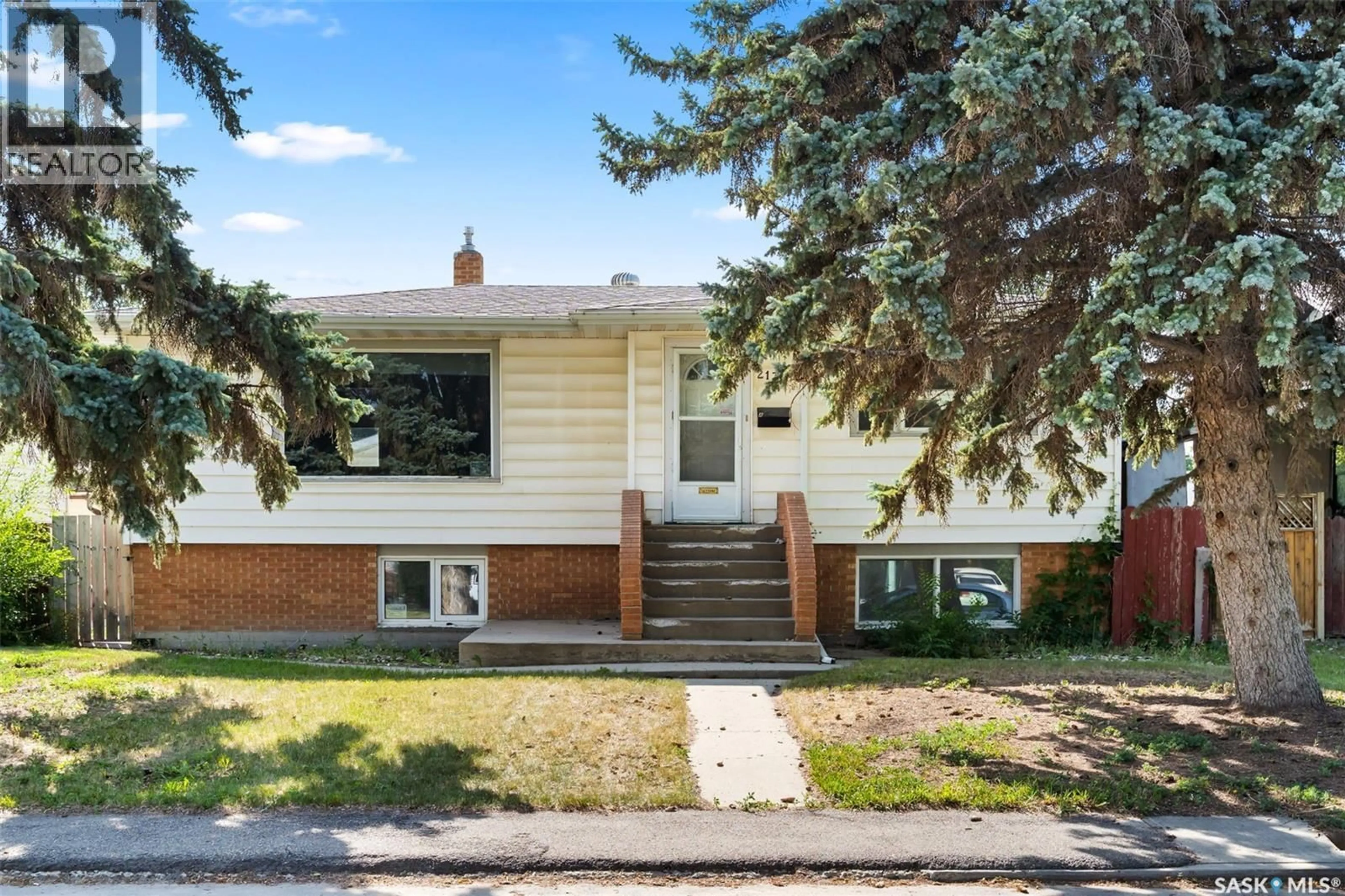 Home with vinyl exterior material, street for 2132 BORDEN STREET, Regina Saskatchewan S4N2K8