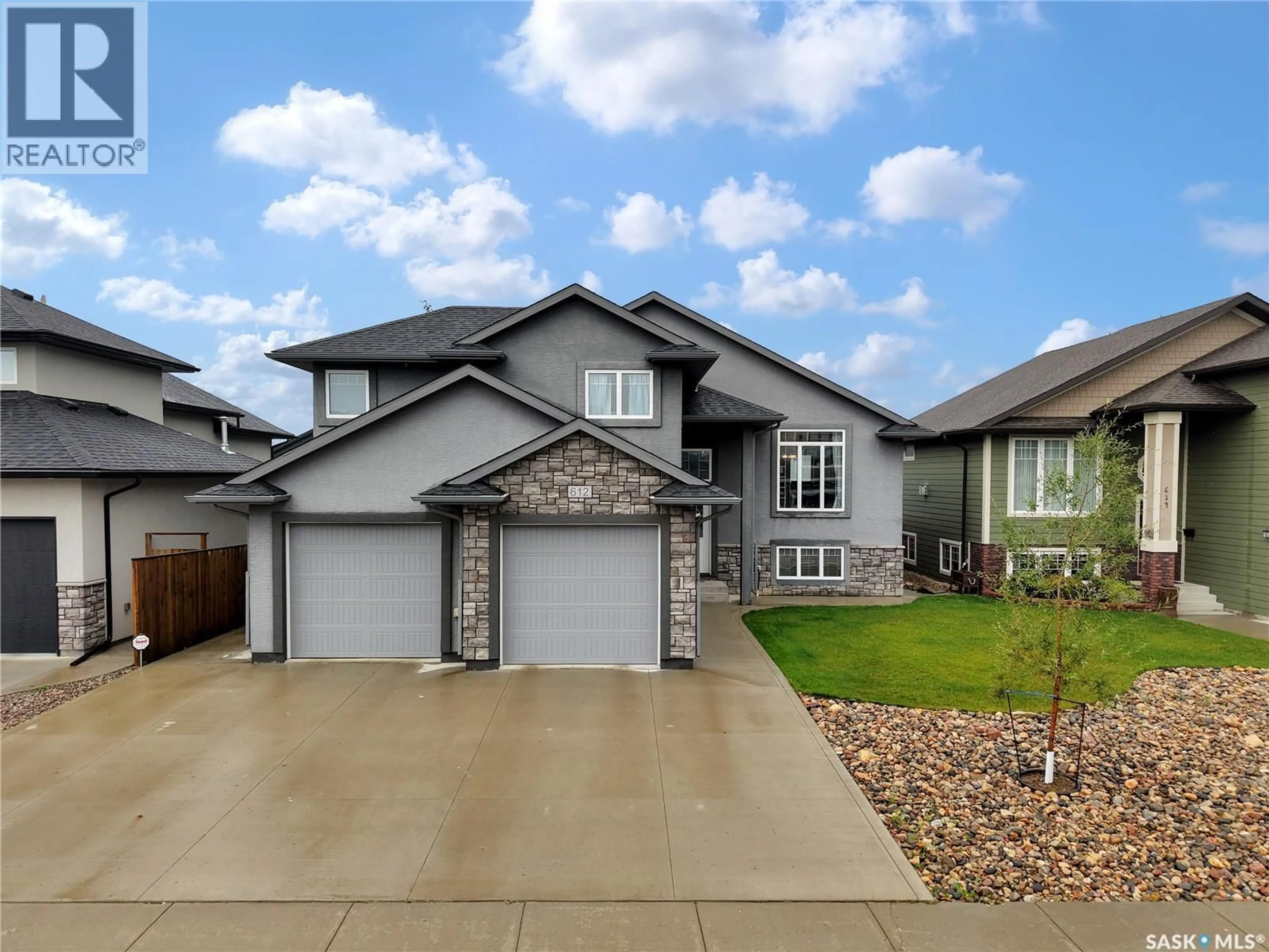 Home with brick exterior material, street for 612 EVERGREEN TERRACE, Warman Saskatchewan S0K4S2
