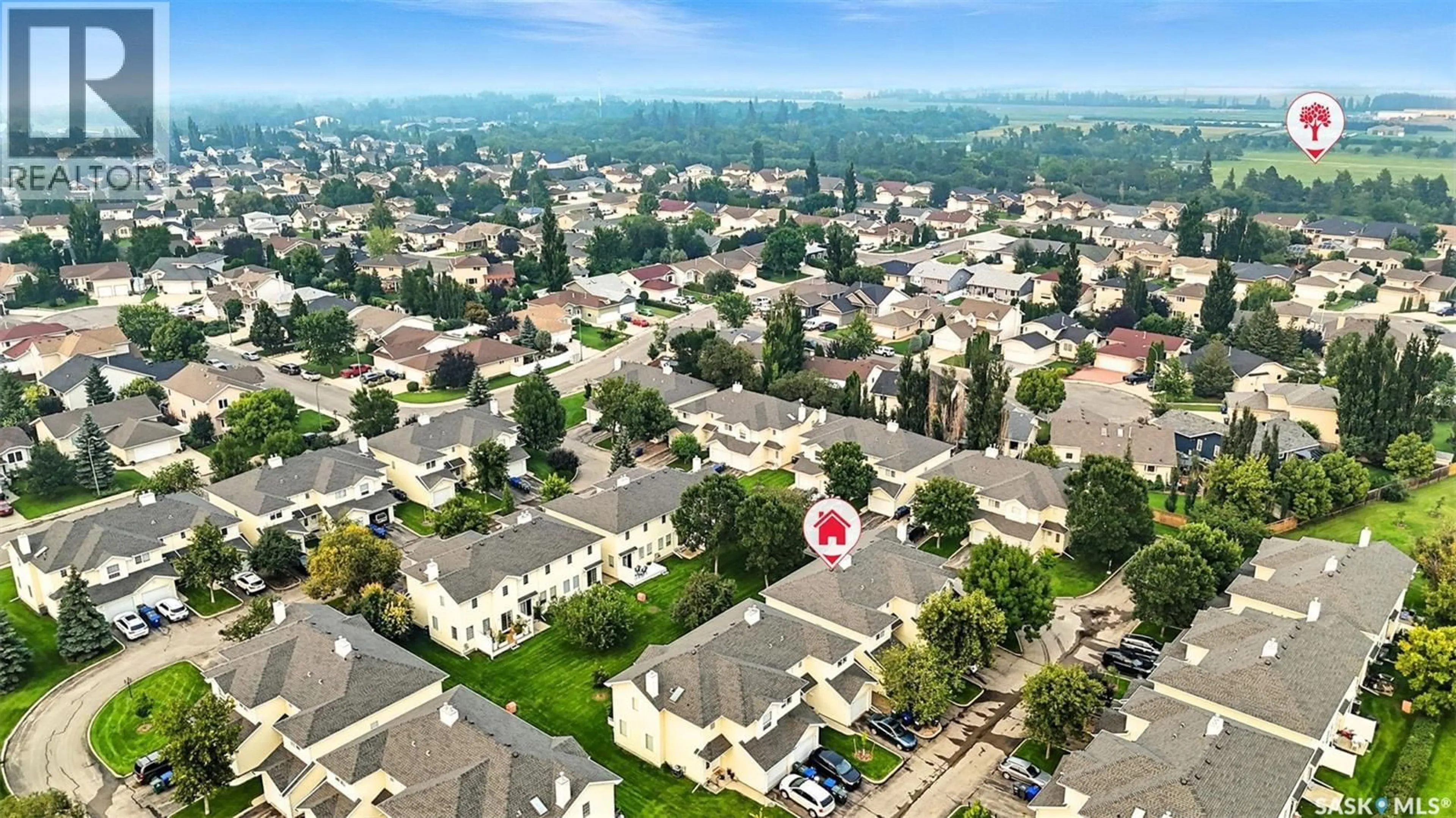 A pic from outside/outdoor area/front of a property/back of a property/a pic from drone, unknown for 111 - 30 FAIRBROTHER CRESCENT, Saskatoon Saskatchewan S7S1L3