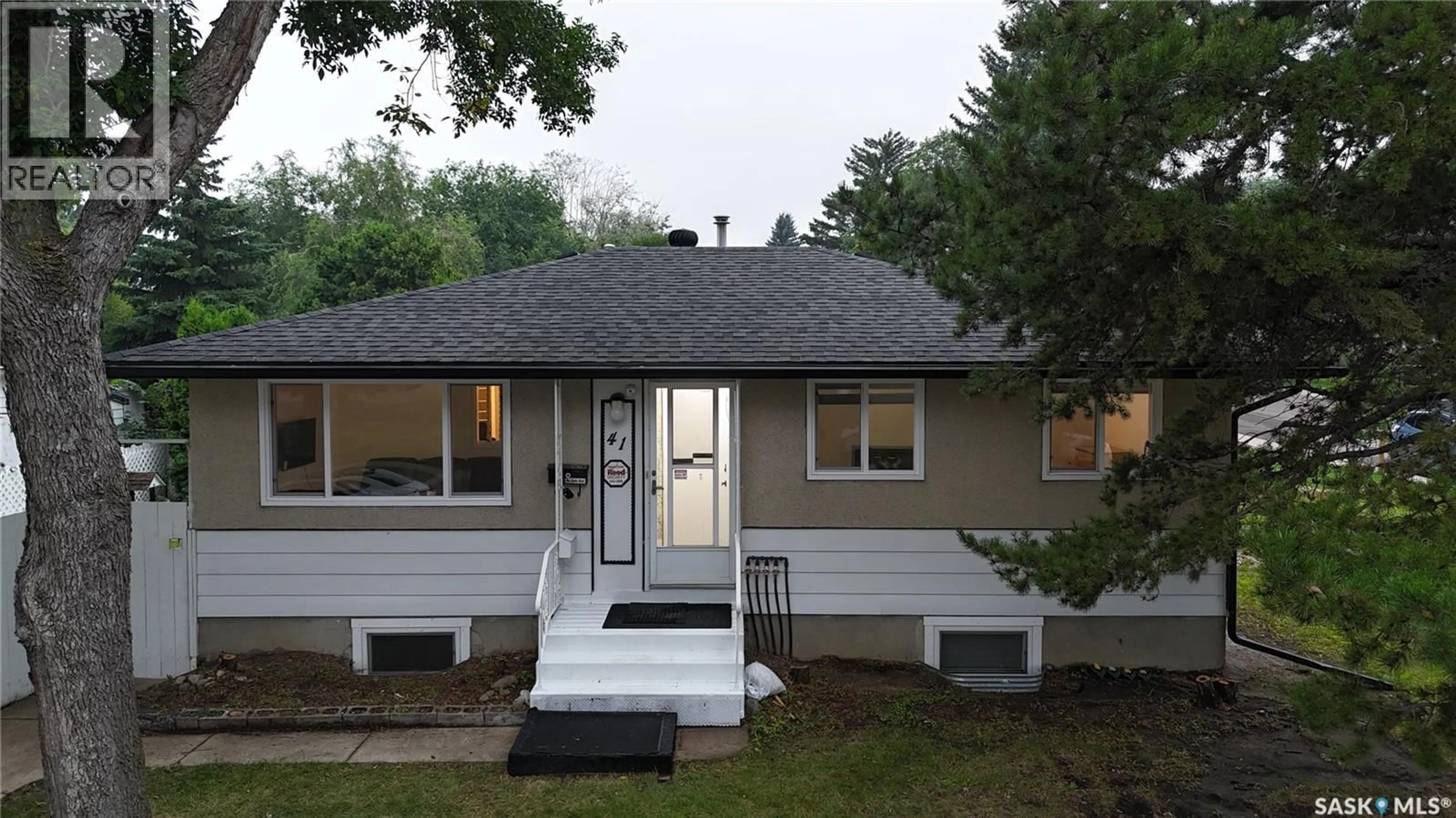 Home with vinyl exterior material, street for 41 CARTIER CRESCENT, Saskatoon Saskatchewan S7L4L8