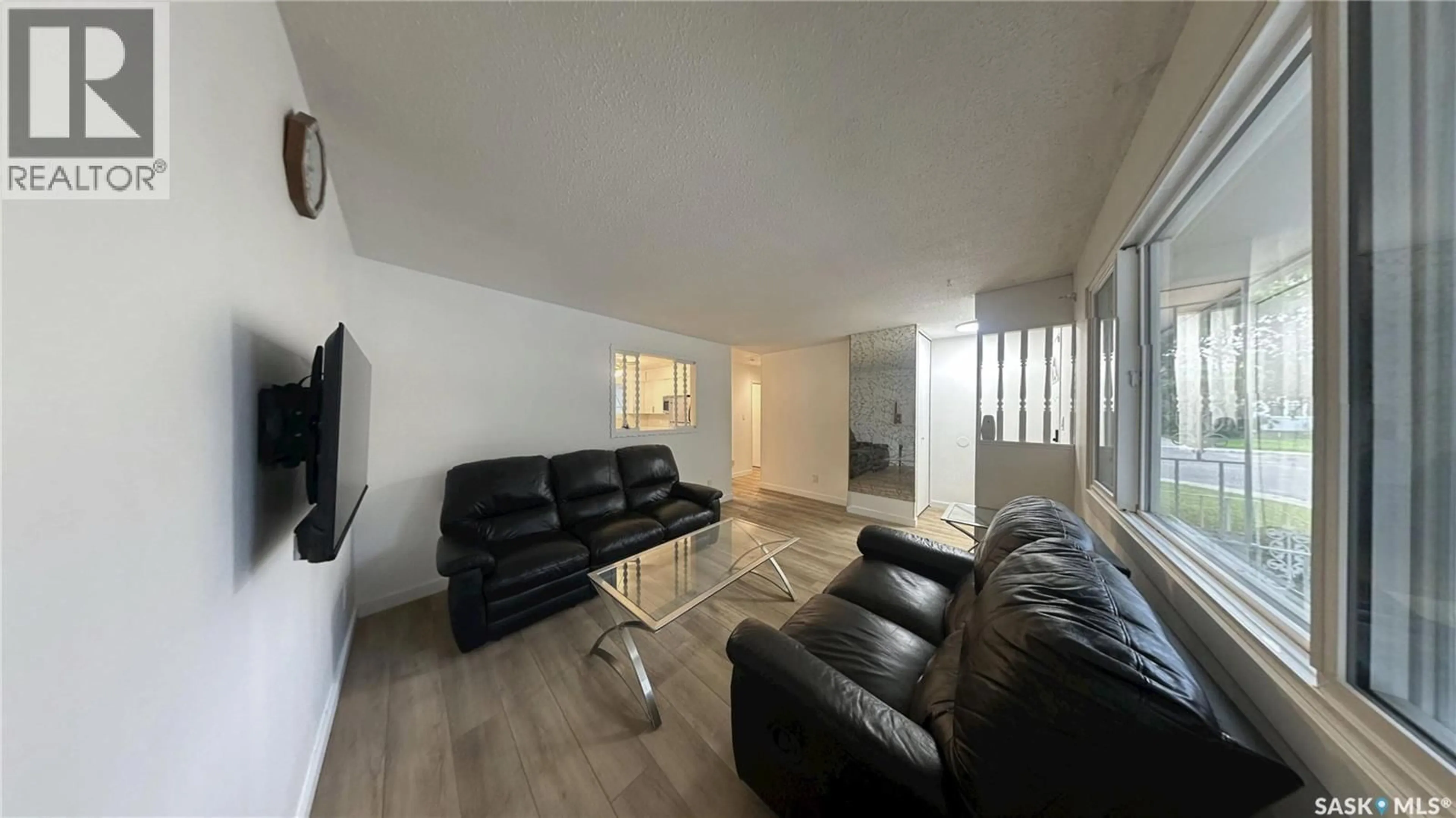 Living room with furniture, unknown for 41 CARTIER CRESCENT, Saskatoon Saskatchewan S7L4L8