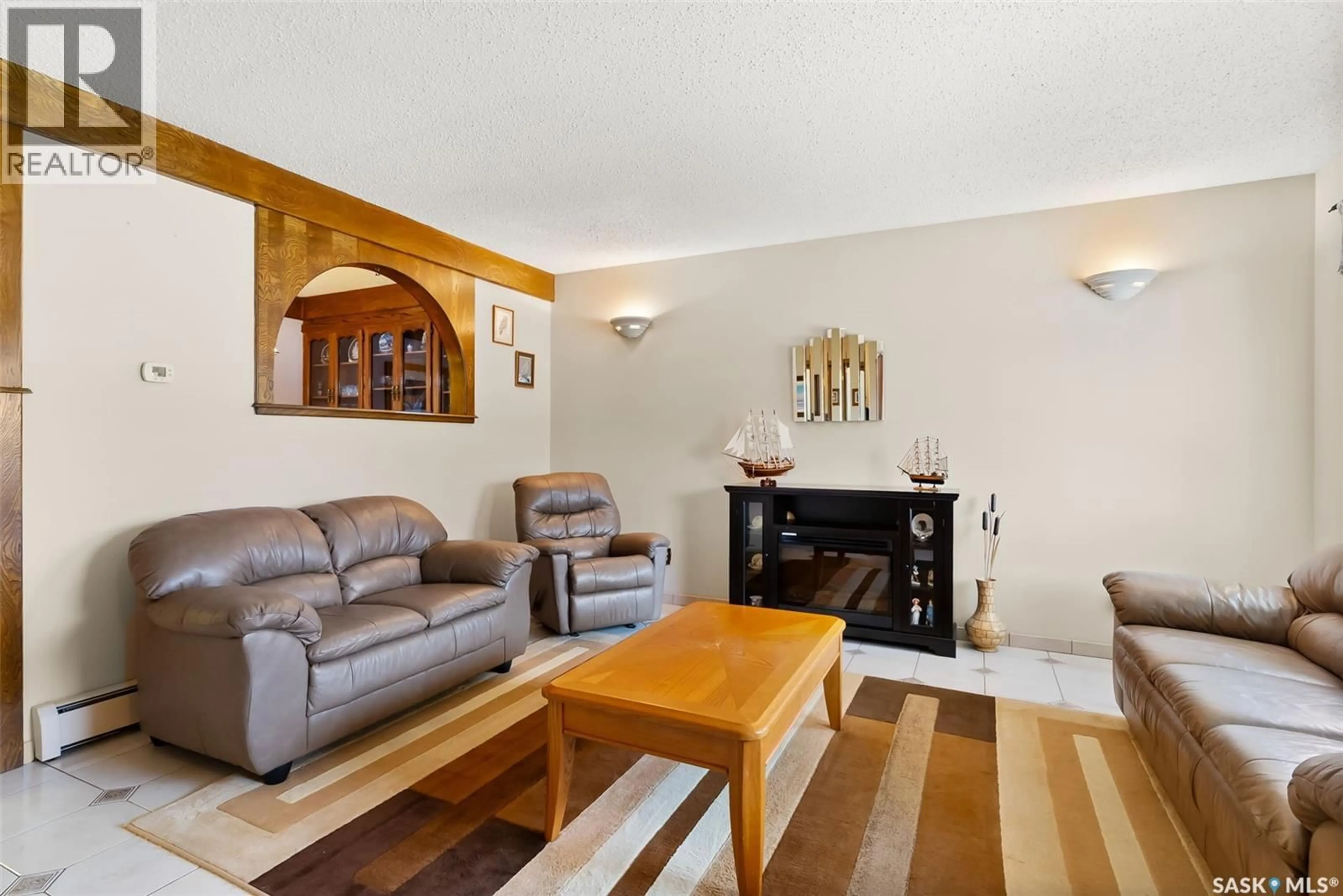 Living room with furniture, unknown for 10 TATE STREET, Regina Saskatchewan S4X1X4