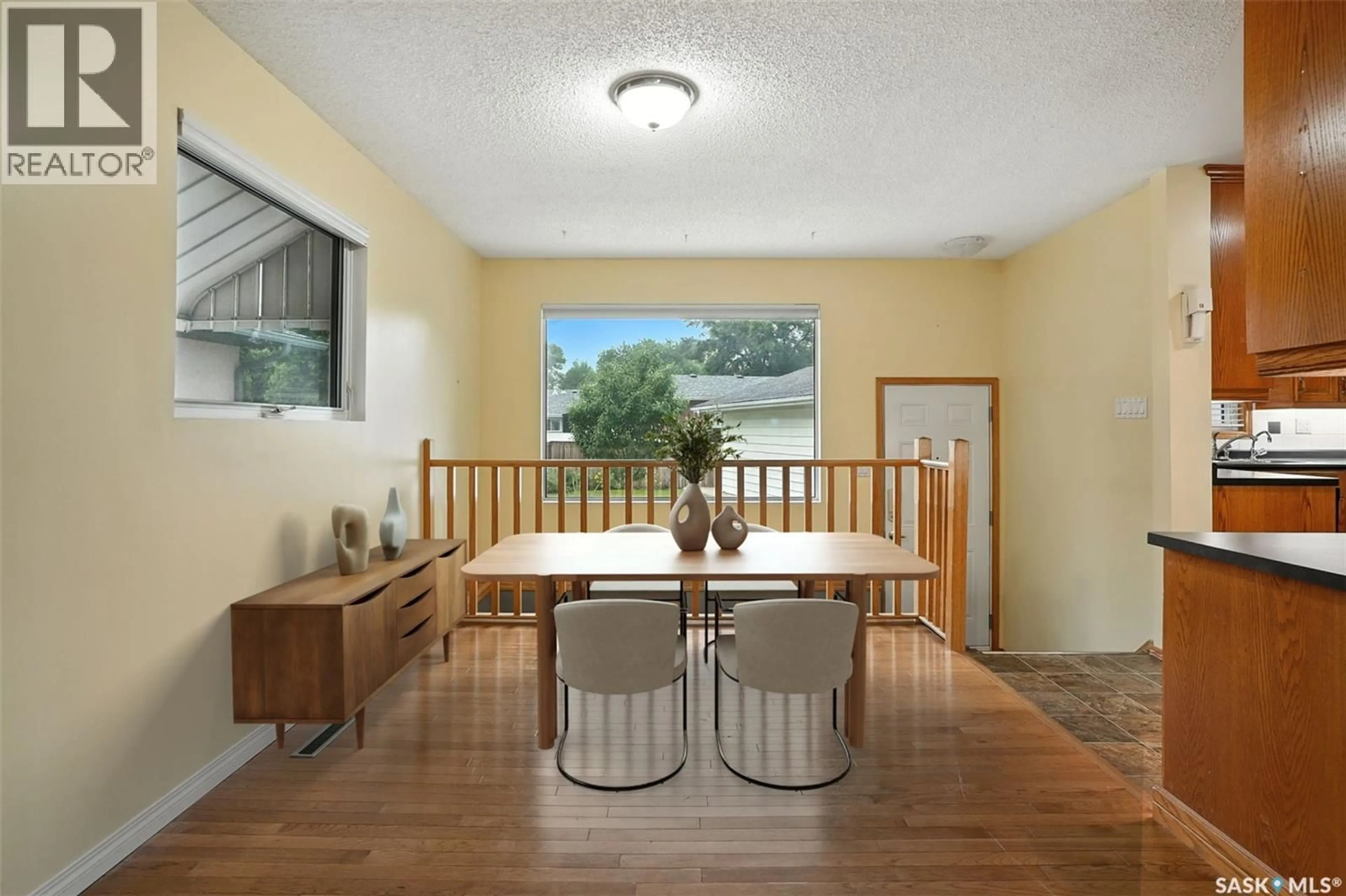 Dining room, wood/laminate floor for 2210 EASTHILL, Saskatoon Saskatchewan S7J3E2