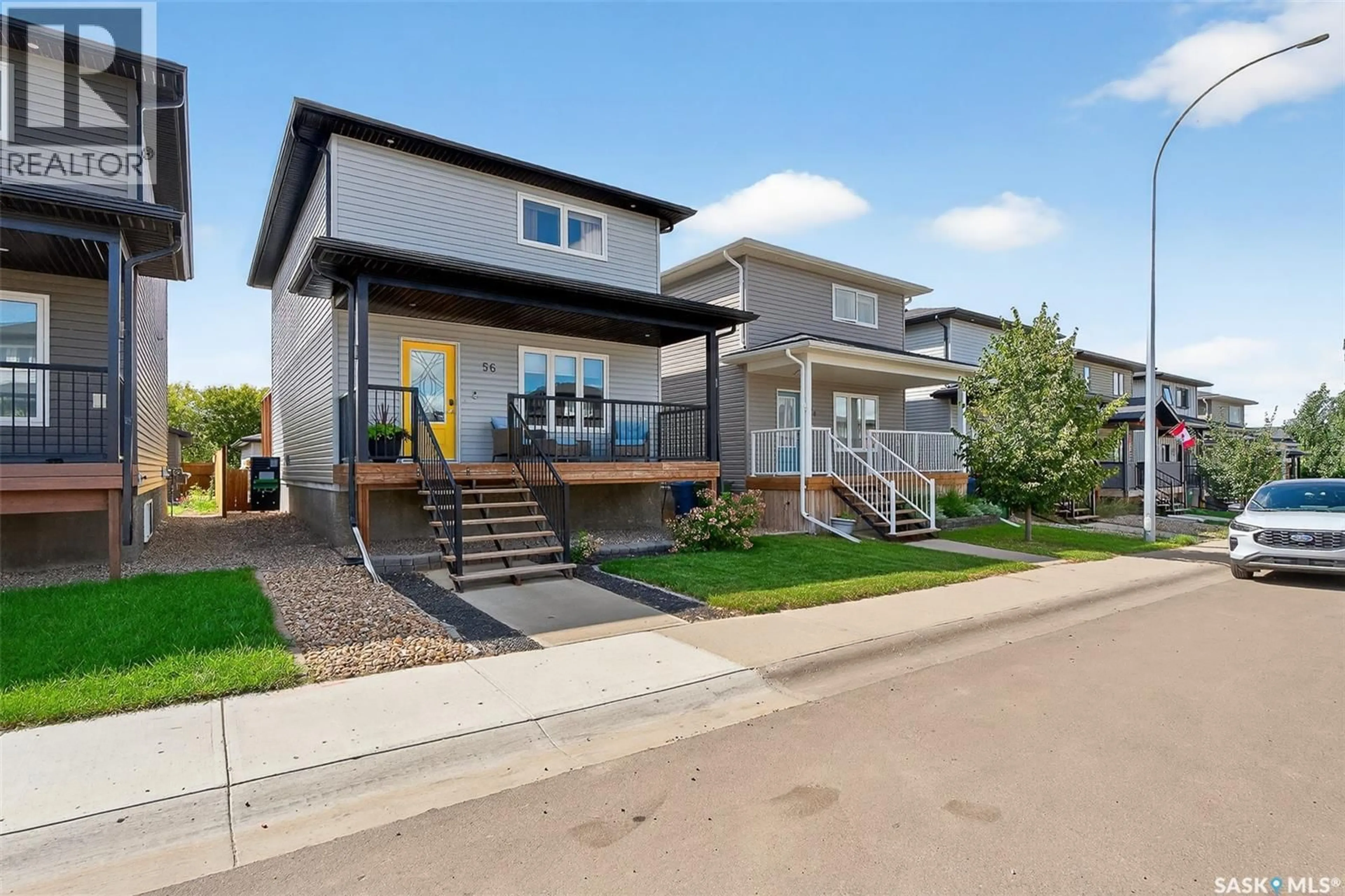 Home with vinyl exterior material, street for 56 BRIGHAM ROAD, Moose Jaw Saskatchewan S6K0A7
