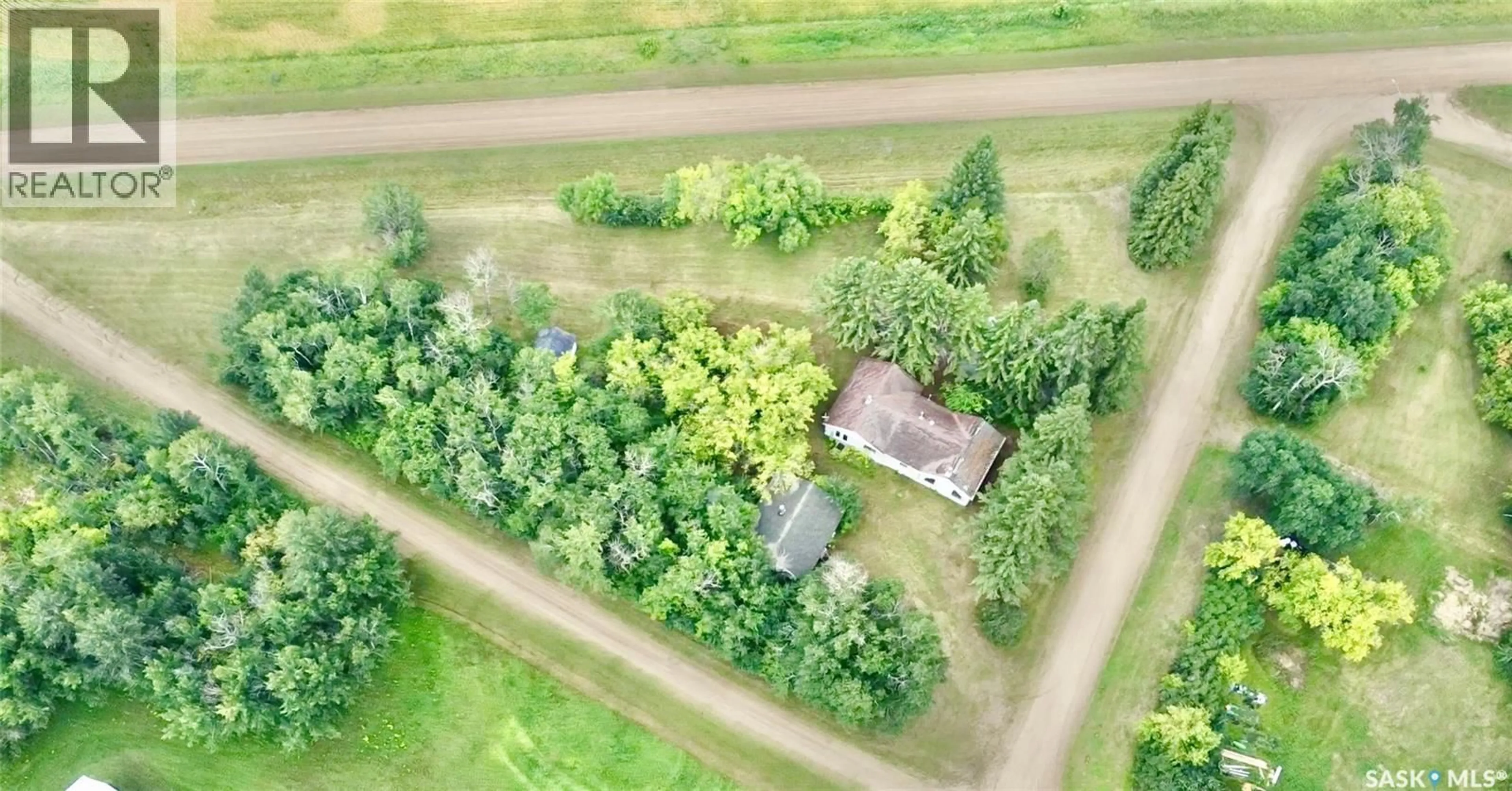 A pic from outside/outdoor area/front of a property/back of a property/a pic from drone, forest/trees view for MARGO ACREAGE, Margo Saskatchewan S0A2M0