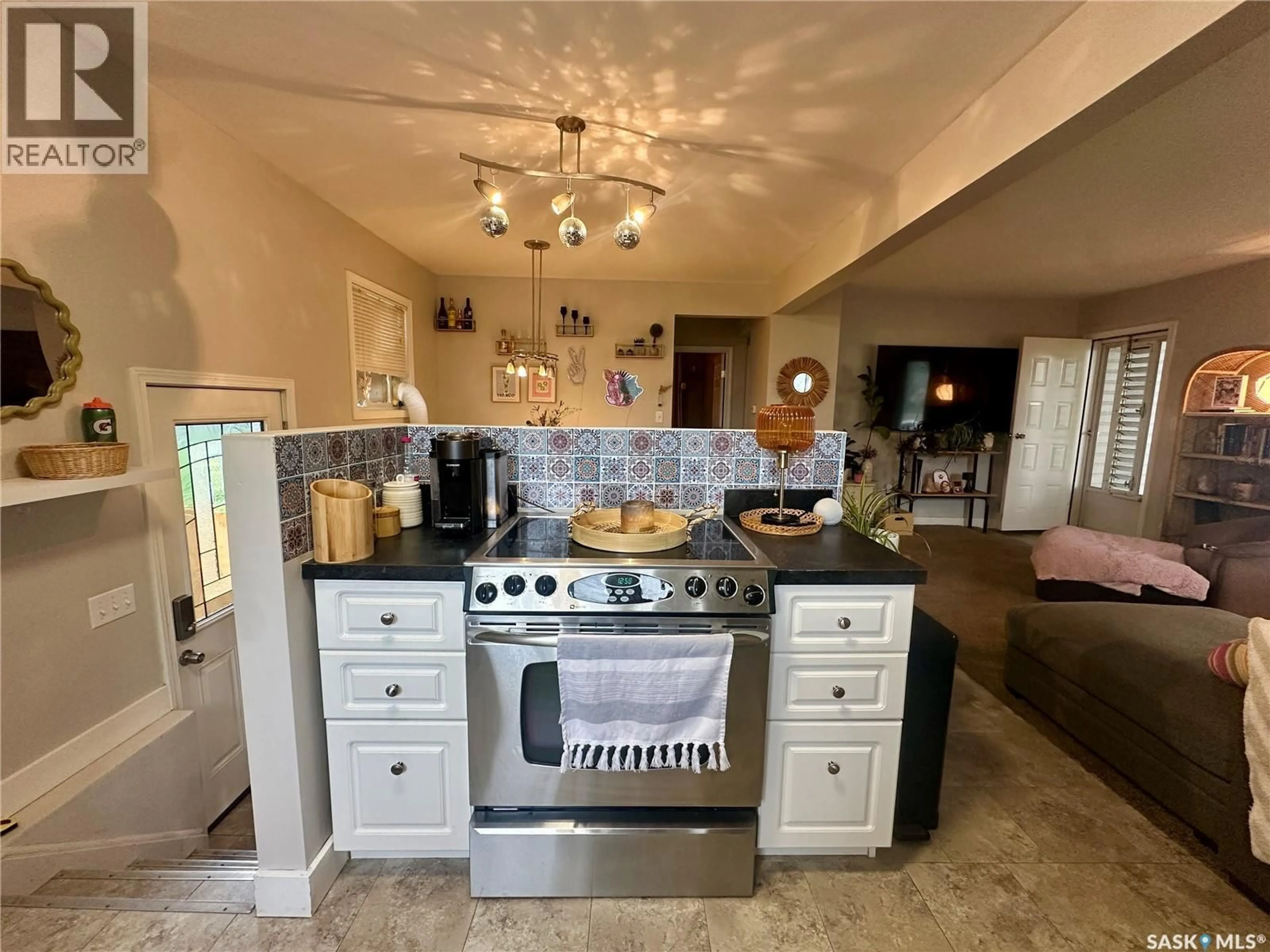 Open concept kitchen, ceramic/tile floor for 304 5TH AVENUE, Canora Saskatchewan S0A0L0
