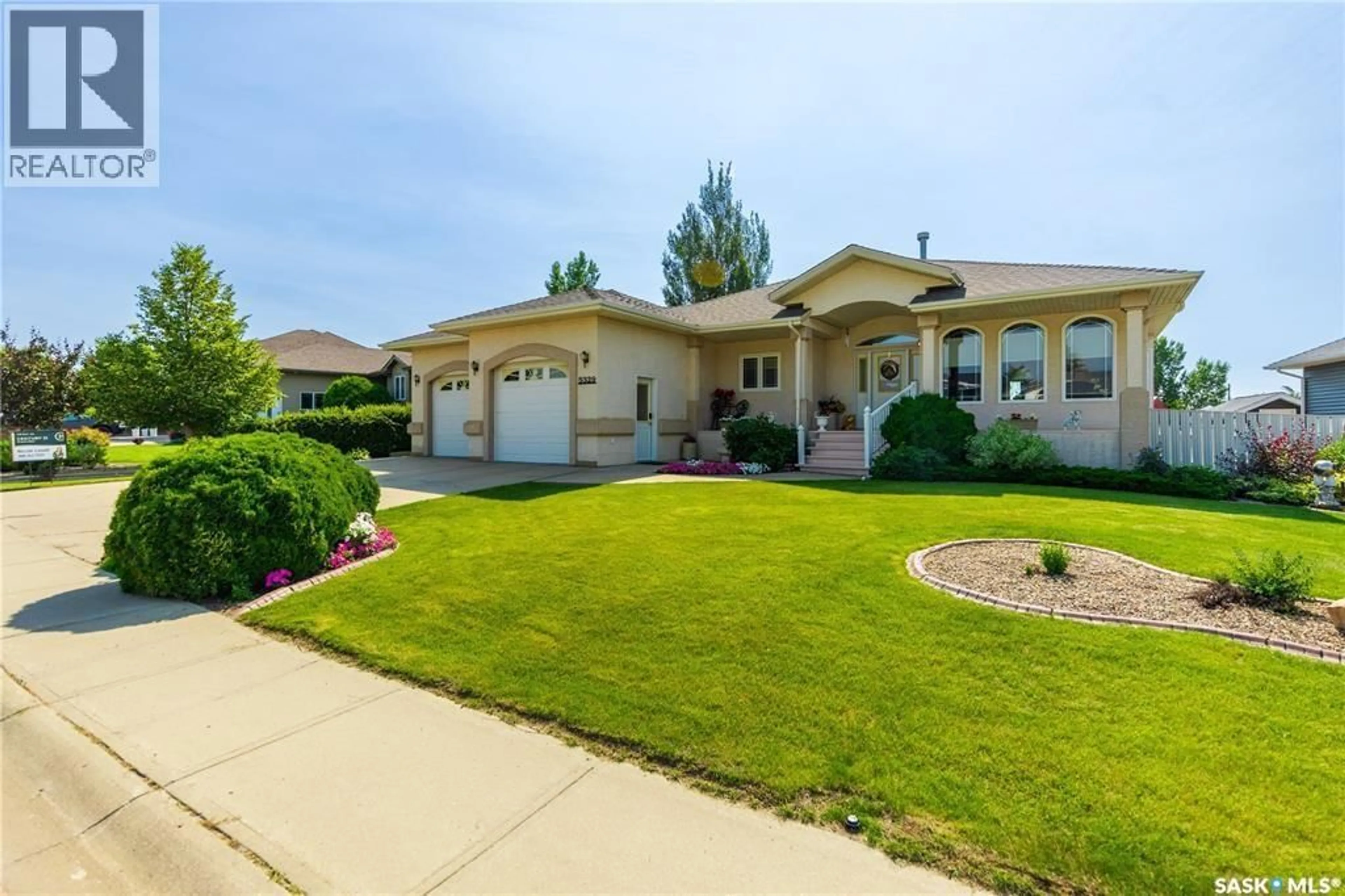 Home with vinyl exterior material, street for 5329 HERALD STREET, Macklin Saskatchewan S0L2C0