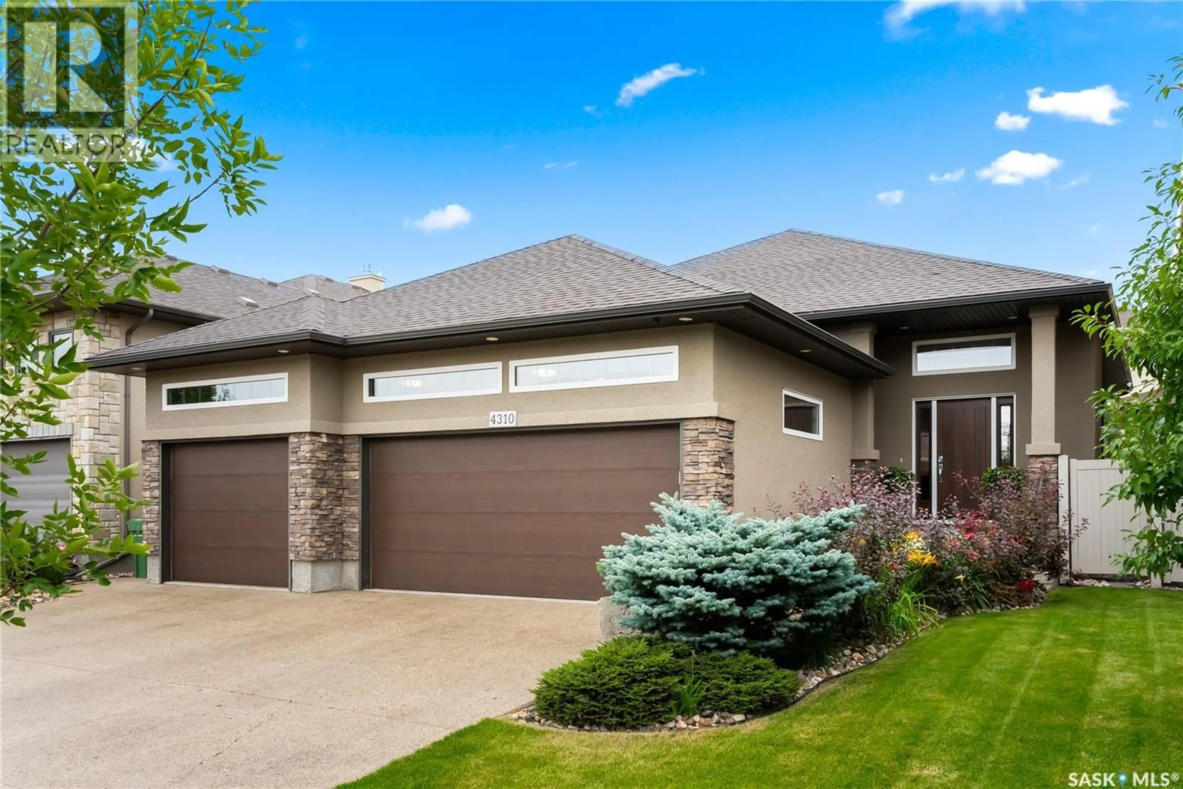 Home with brick exterior material, street for 4310 CHUKA DRIVE, Regina Saskatchewan S4V3H7