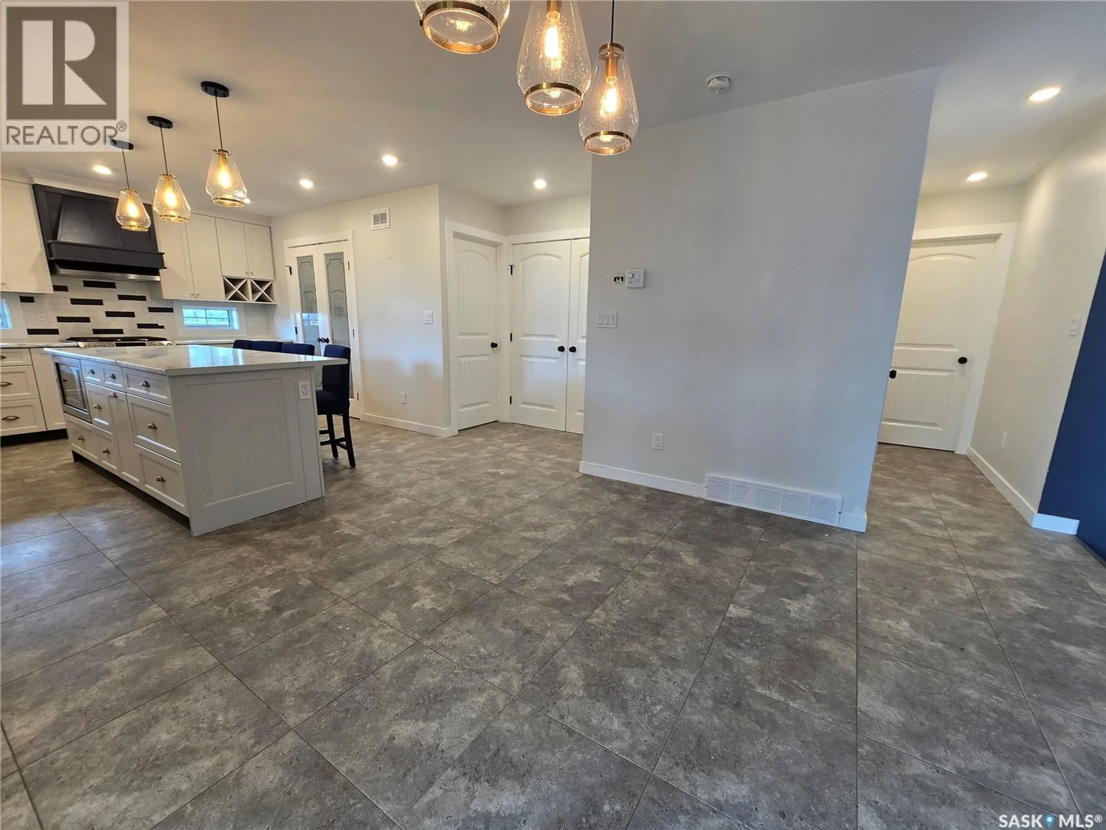 Open concept kitchen, ceramic/tile floor for 28 GRUENENTHAL DRIVE, Rosthern Rm No. 403 Saskatchewan S0K3A0