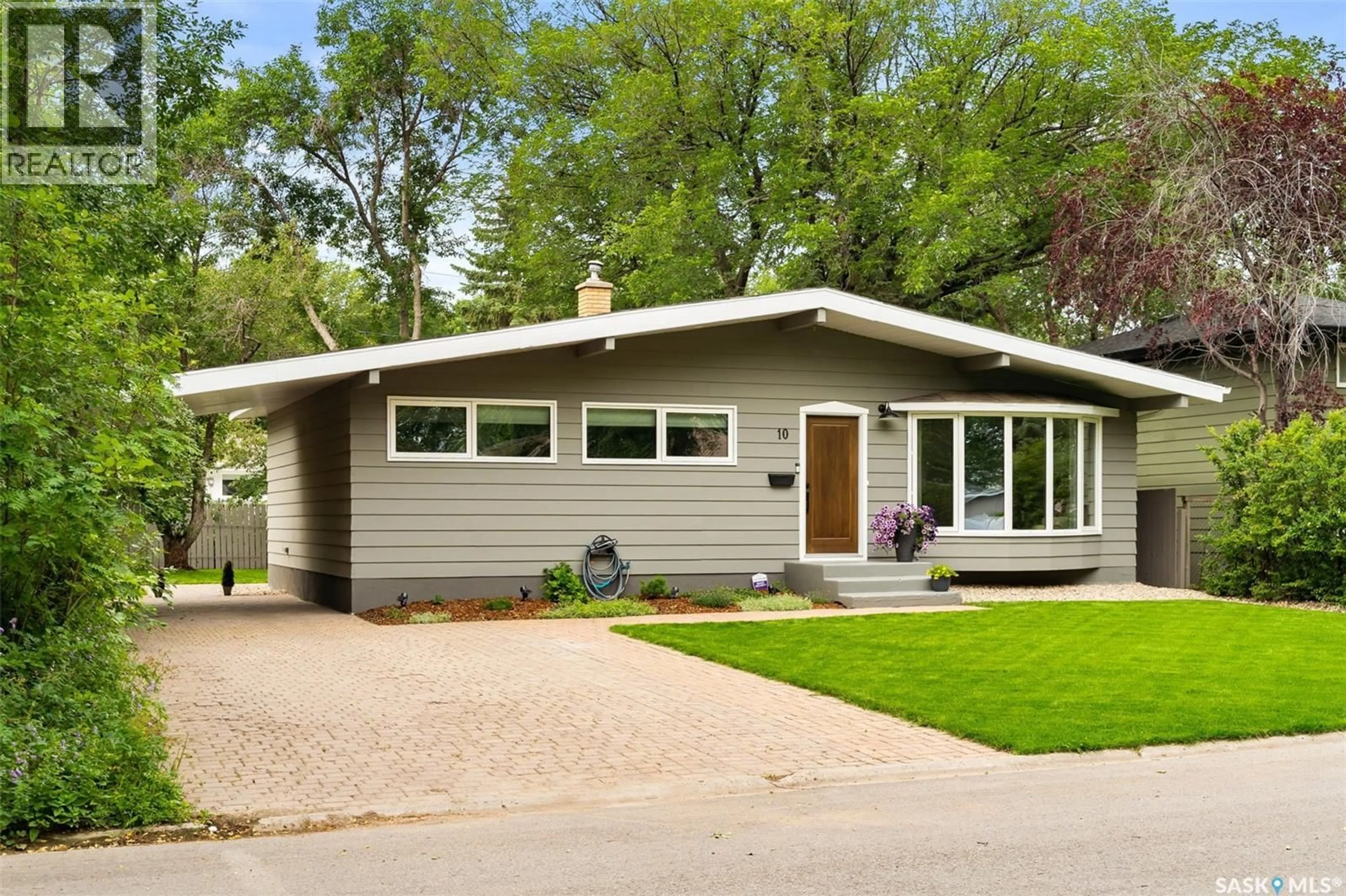 Home with vinyl exterior material, street for 10 MARSH CRESCENT, Regina Saskatchewan S4S5R4