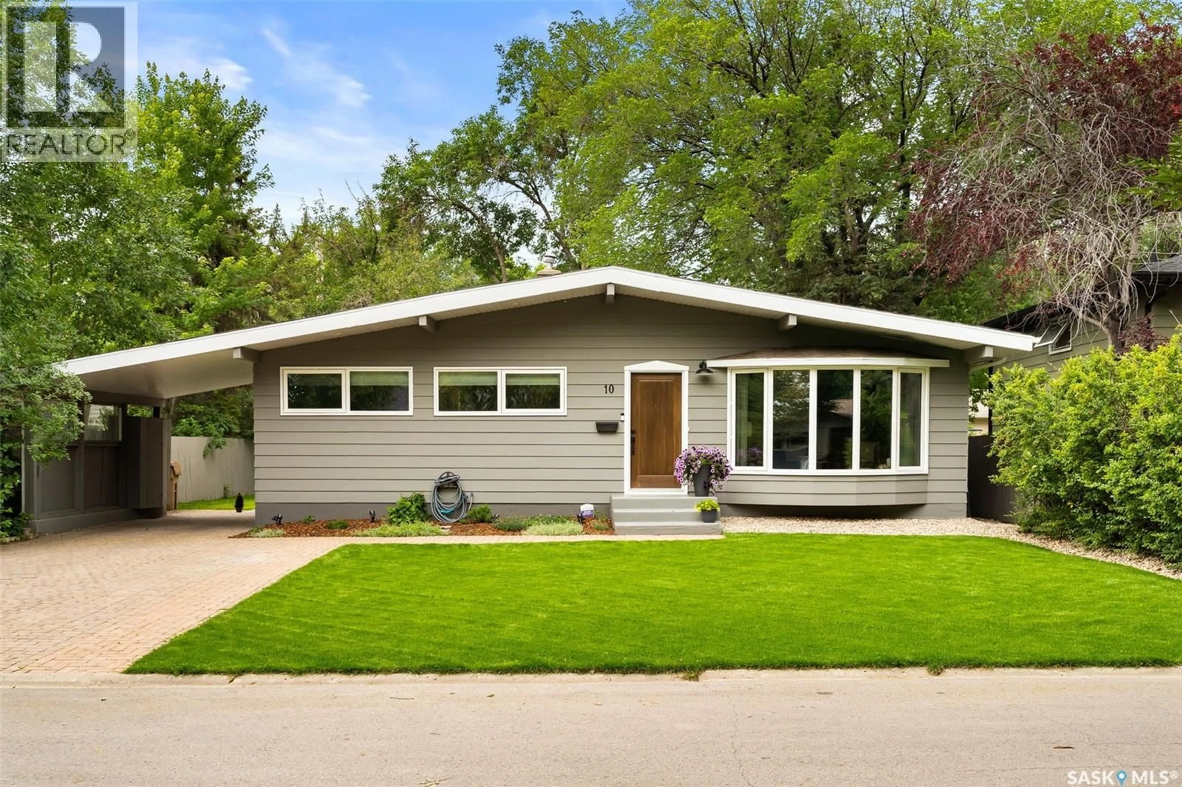 Home with vinyl exterior material, street for 10 MARSH CRESCENT, Regina Saskatchewan S4S5R4
