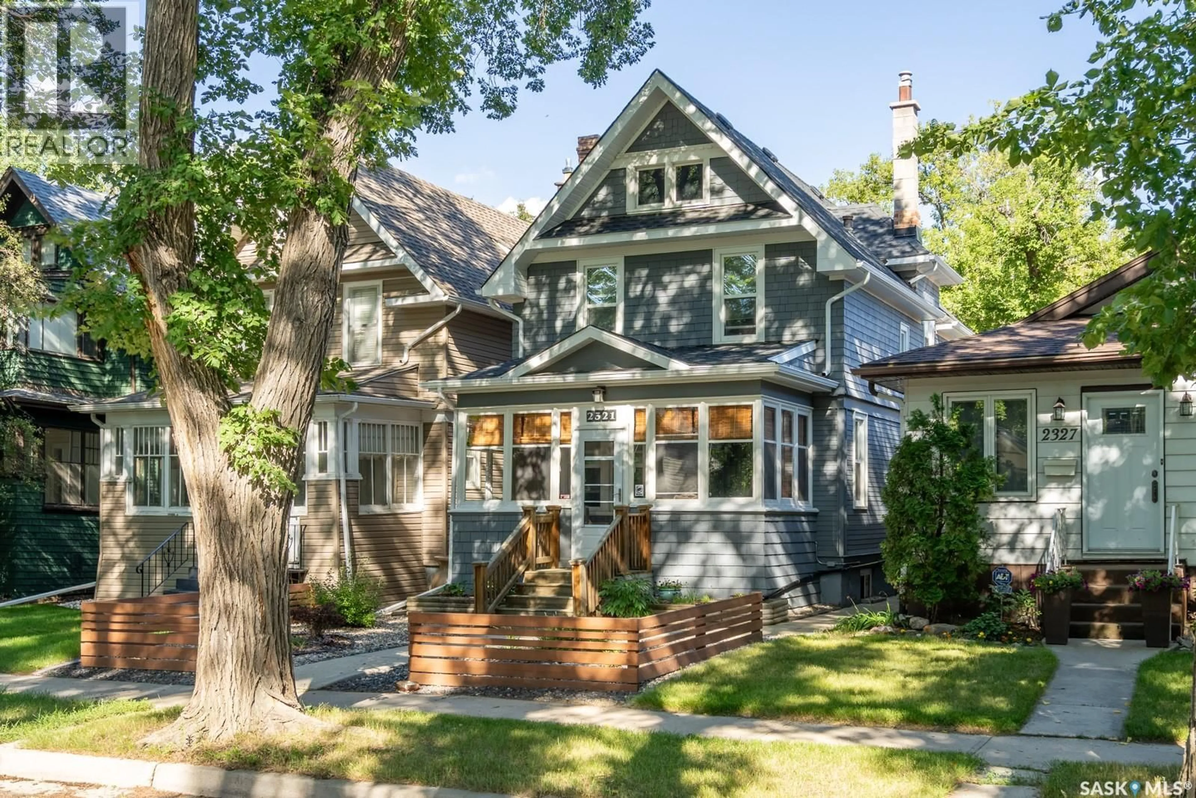Home with vinyl exterior material, street for 2321 GARNET STREET, Regina Saskatchewan S4T3A3