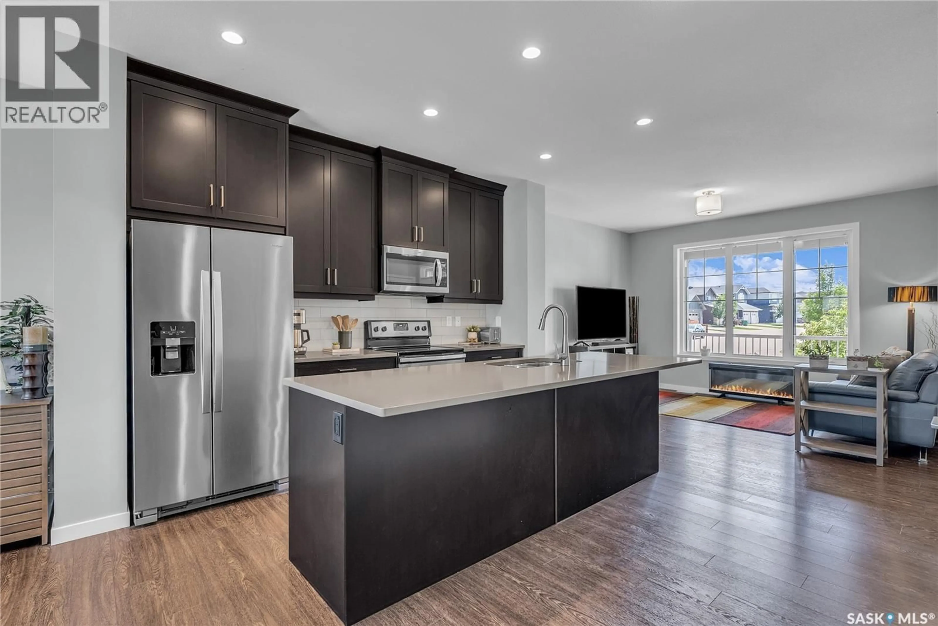 Open concept kitchen, unknown for 127 NEWTON WAY, Saskatoon Saskatchewan S7V0N6
