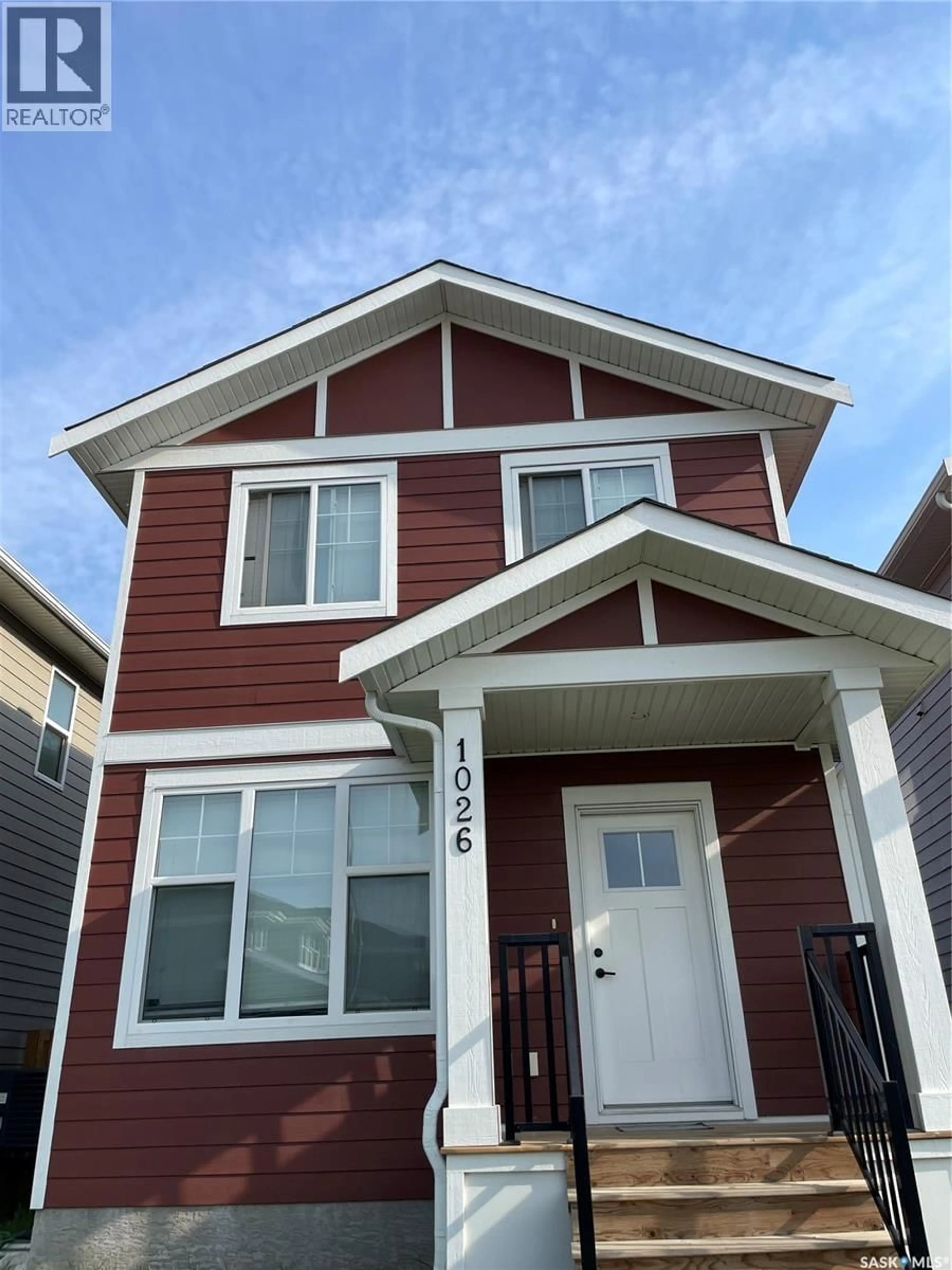 Home with vinyl exterior material, street for 1026 STILLING STREET, Saskatoon Saskatchewan S7V0X2