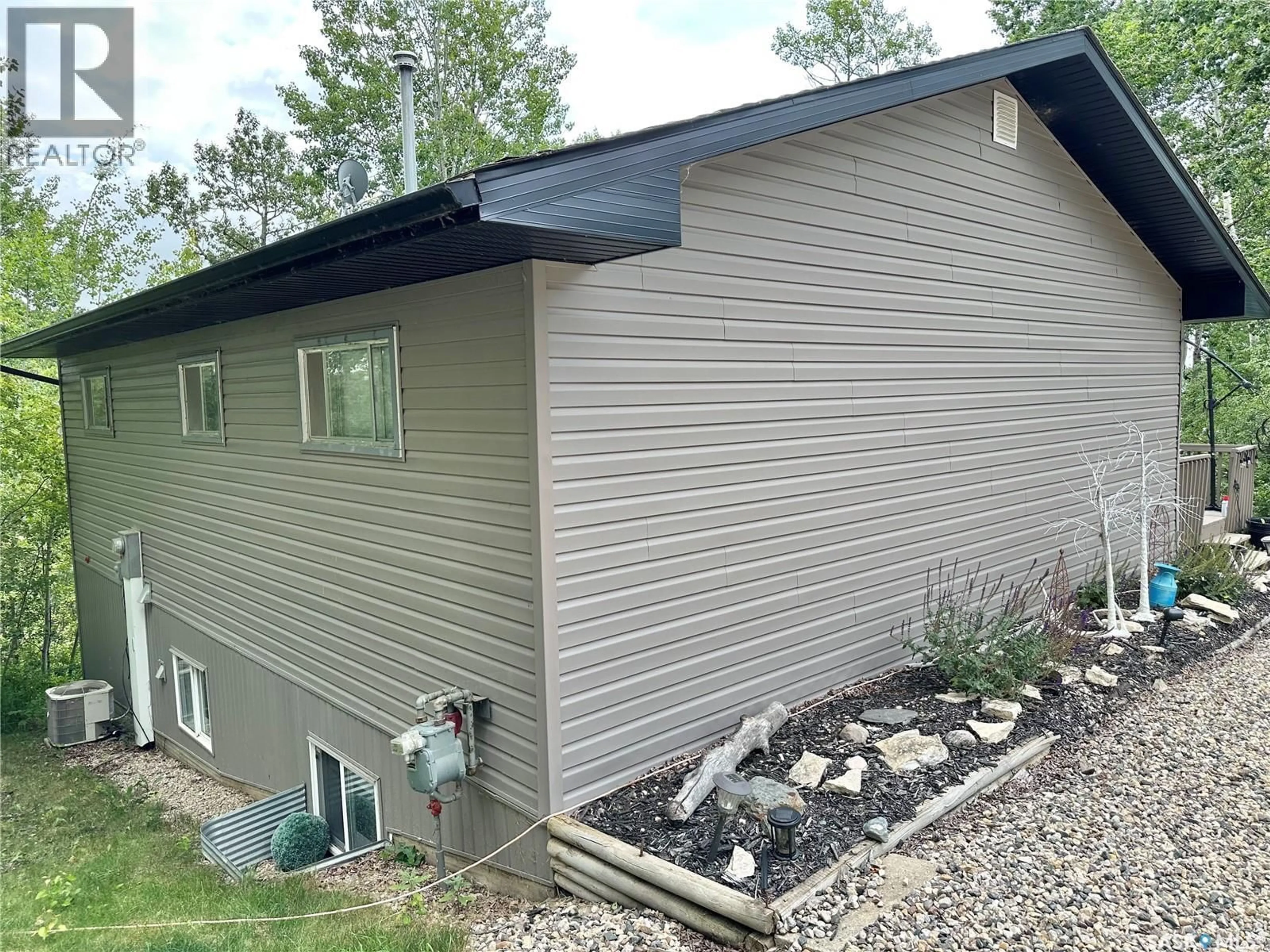 Home with vinyl exterior material, building for 100 MISTY BAY DRIVE, Big Shell Saskatchewan S0J2G0