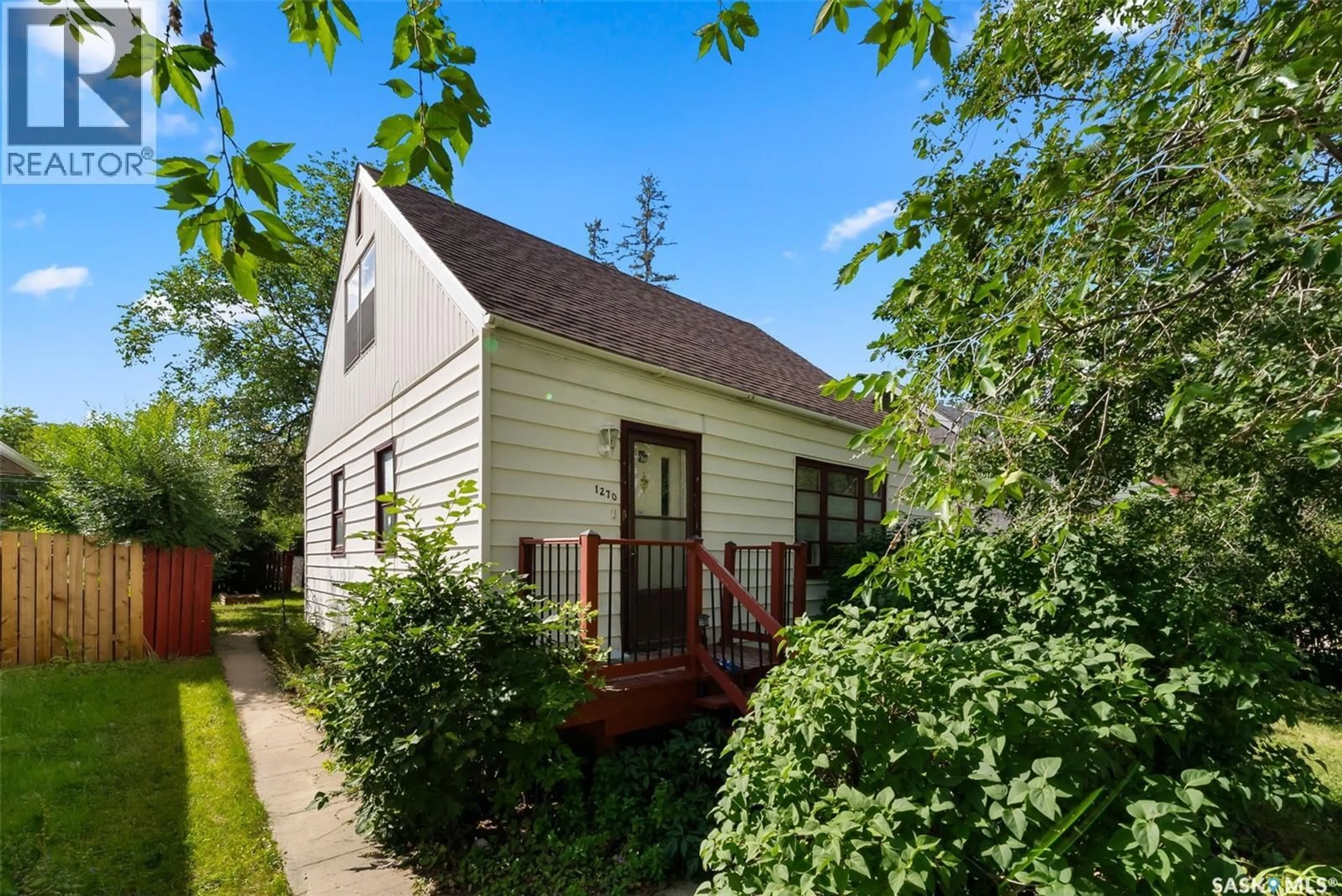 Home with vinyl exterior material, street for 1270 PASQUA STREET, Regina Saskatchewan S4T4L2