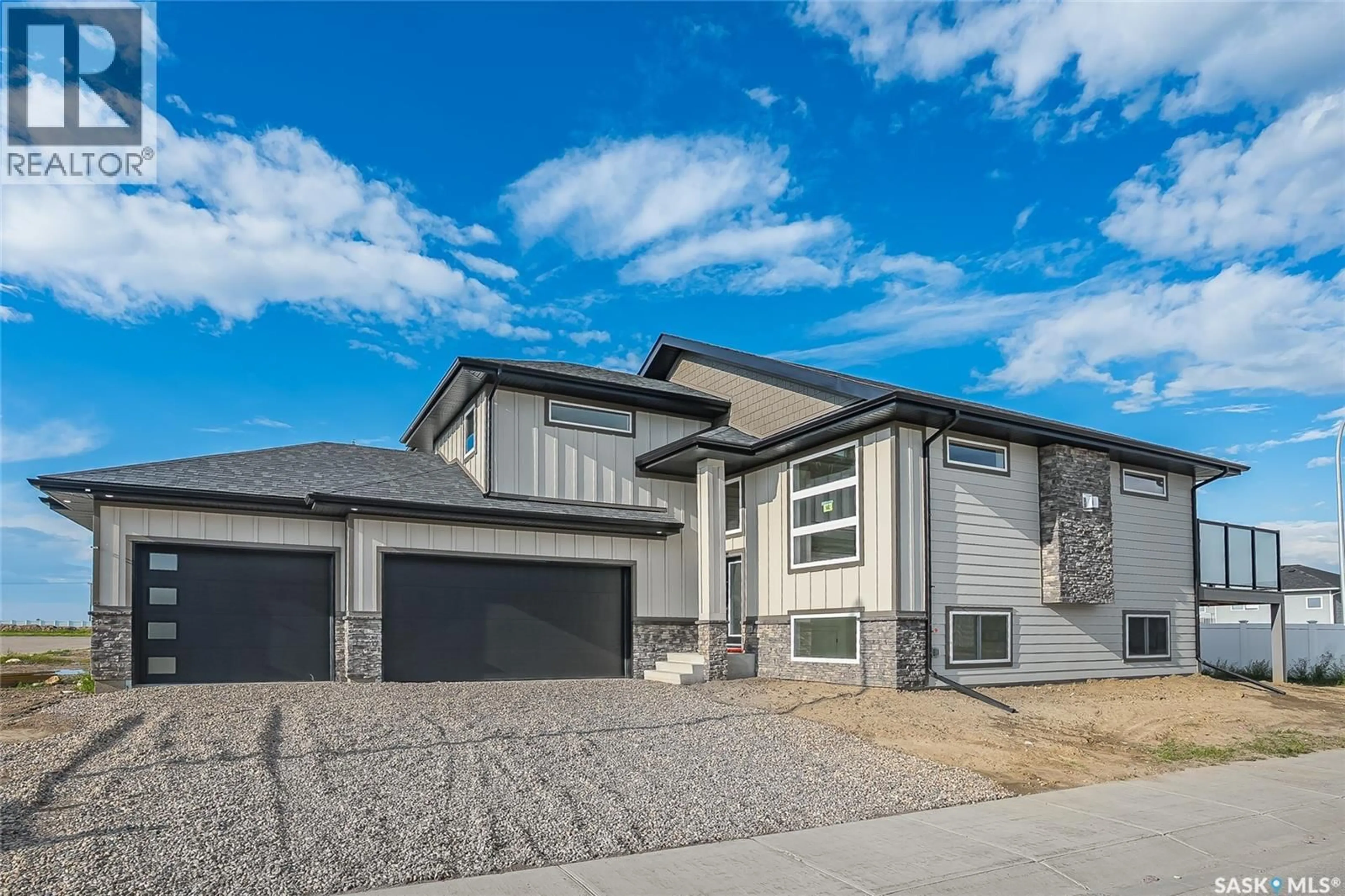 Home with vinyl exterior material, street for 842 BALLESTEROS CRESCENT, Warman Saskatchewan S0K4S4