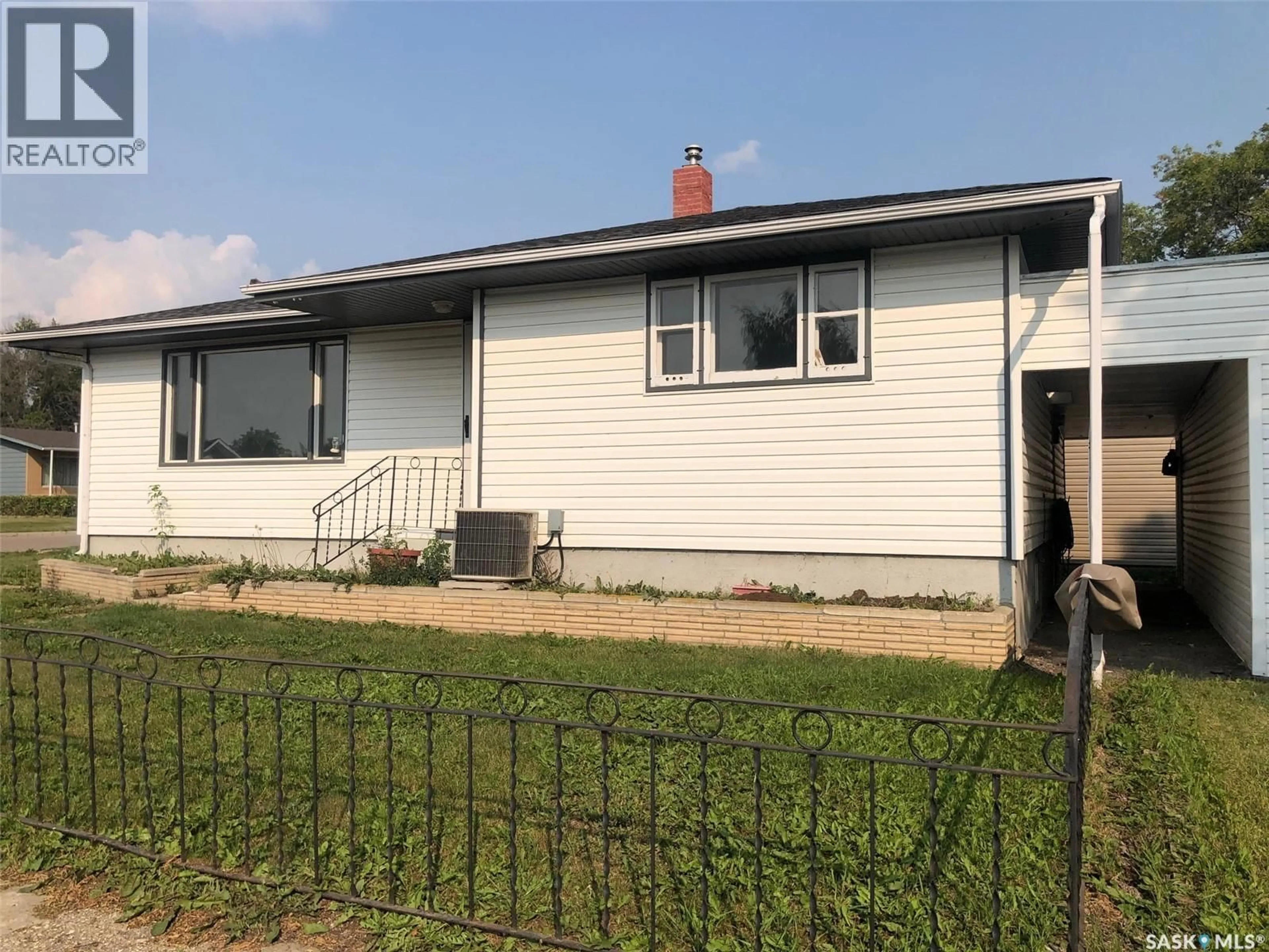 Home with vinyl exterior material, street for E - 303 FOURTH AVENUE, Canora Saskatchewan S0A0L0