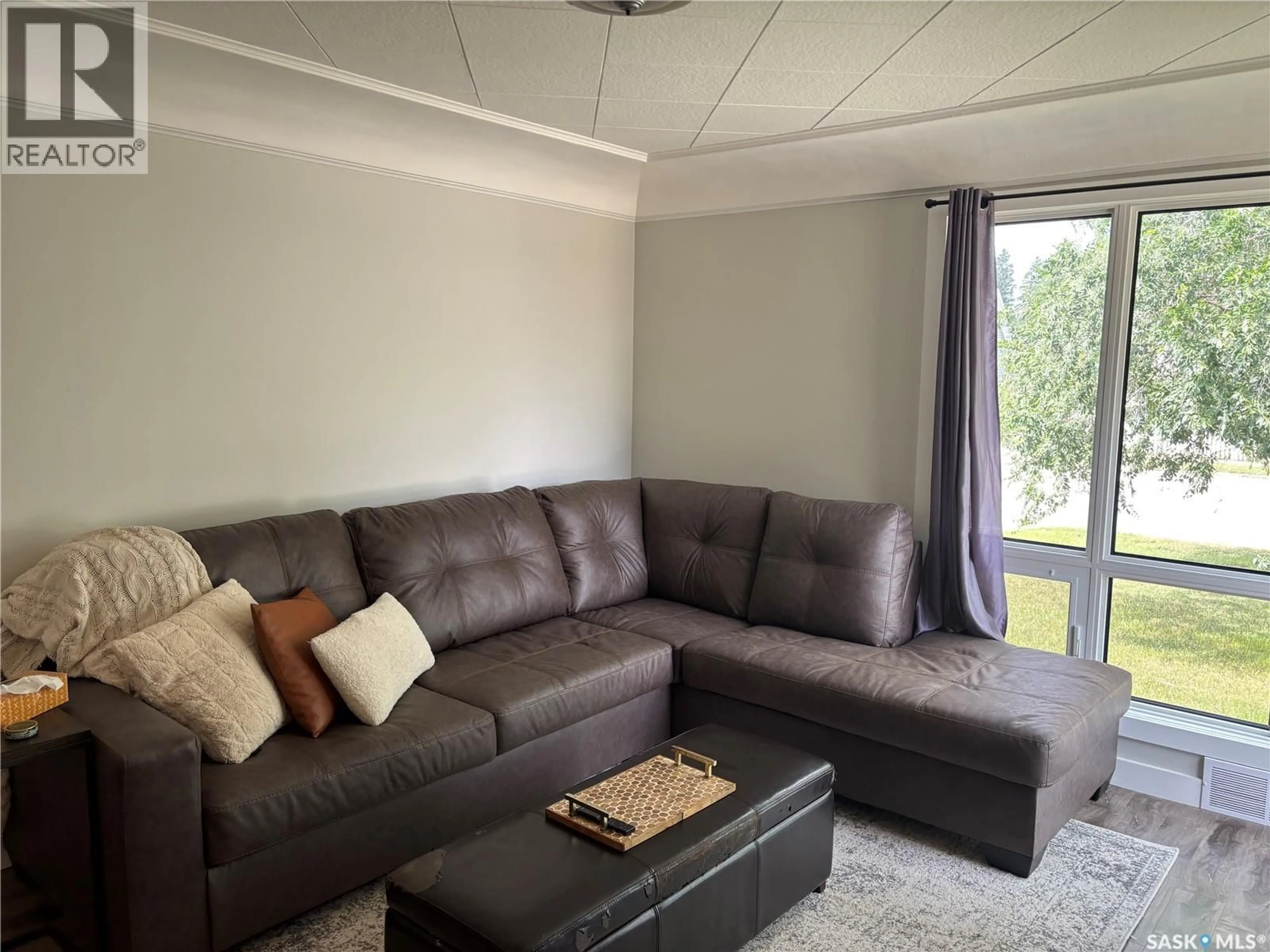 Living room with furniture, unknown for 136 10TH STREET, Weyburn Saskatchewan S4H1G9