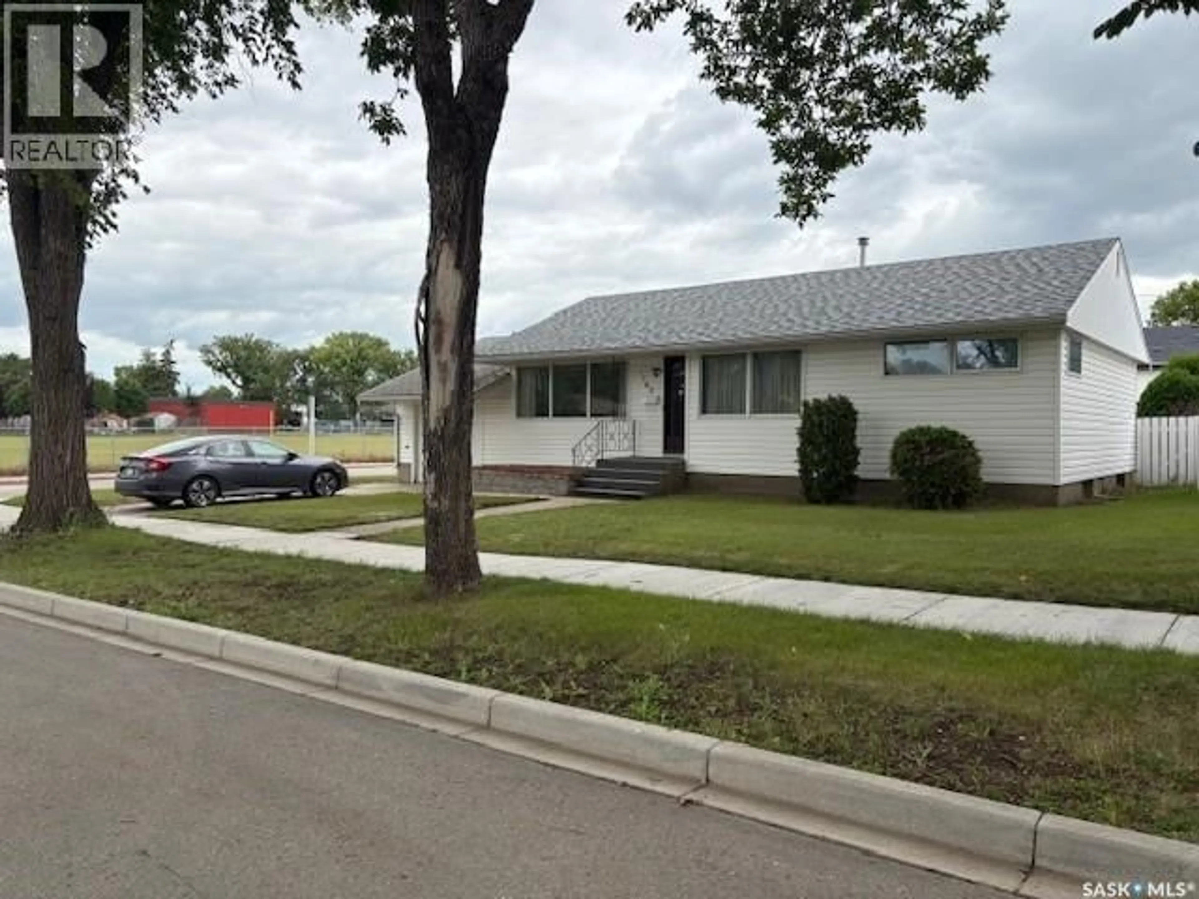 Home with vinyl exterior material, street for 1762 98TH STREET, North Battleford Saskatchewan S9A0N1