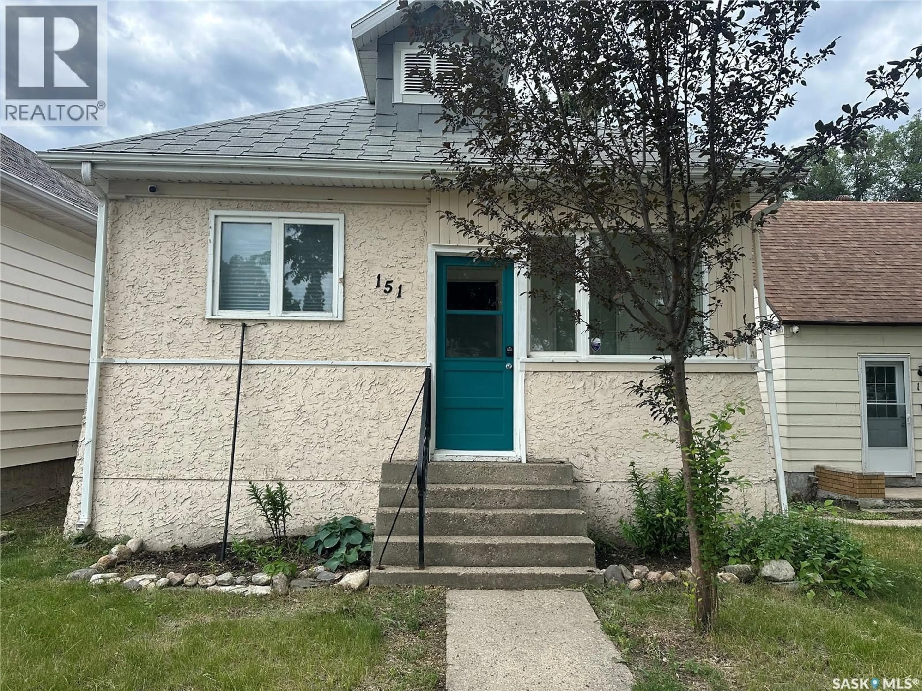 Home with brick exterior material, street for 151 COTEAU STREET, Moose Jaw Saskatchewan S6H5C4