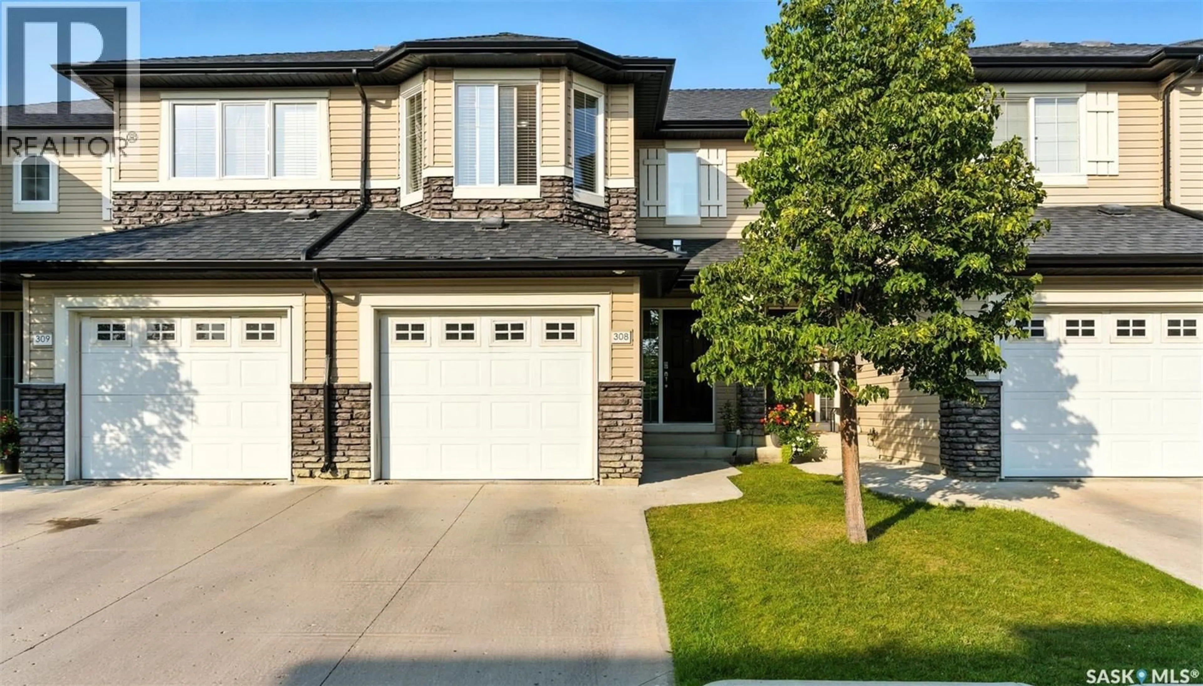 Home with vinyl exterior material, street for 308 - 410 LEDINGHAM WAY, Saskatoon Saskatchewan S7V0C4