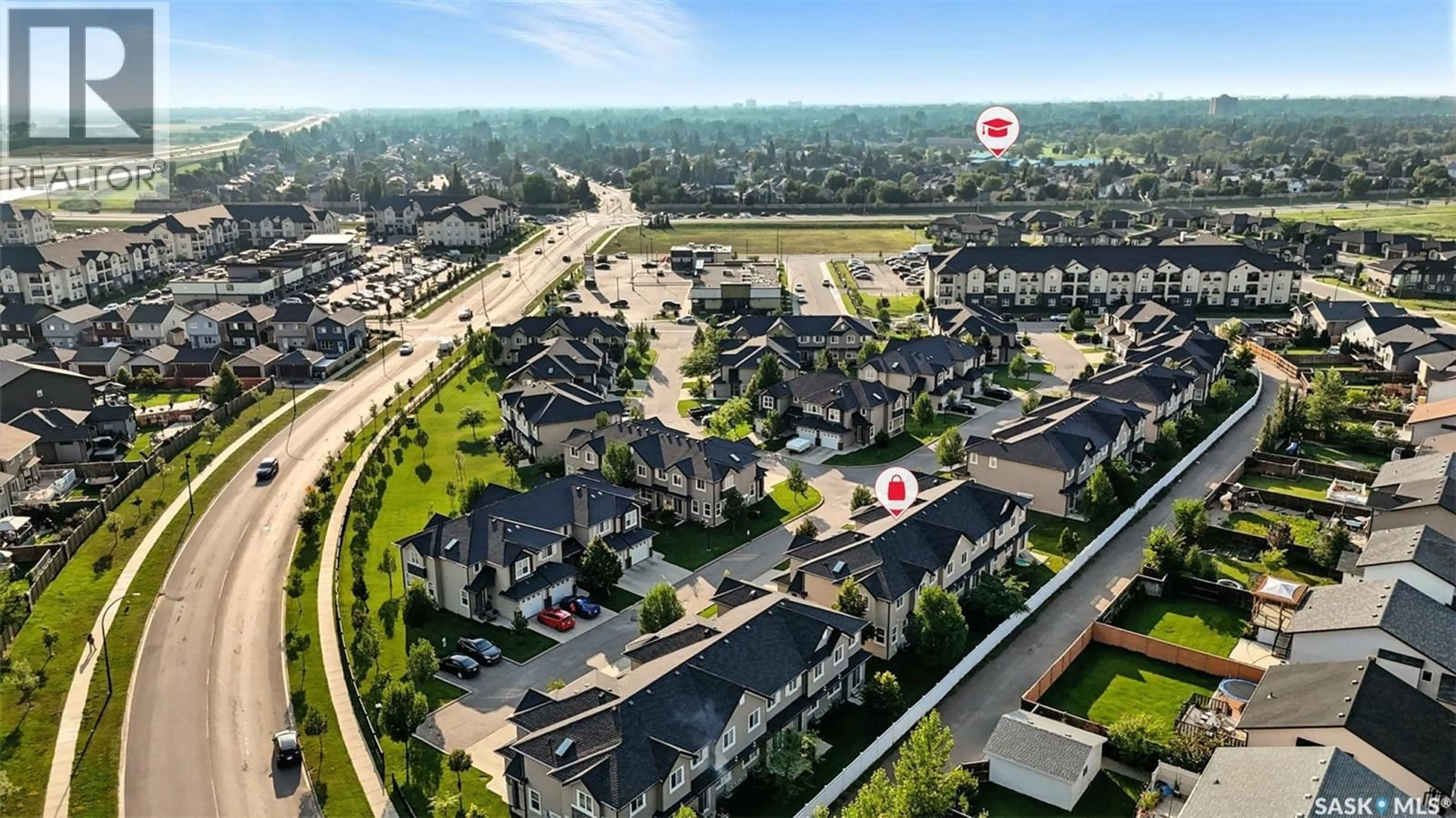 A pic from outside/outdoor area/front of a property/back of a property/a pic from drone, street for 308 - 410 LEDINGHAM WAY, Saskatoon Saskatchewan S7V0C4