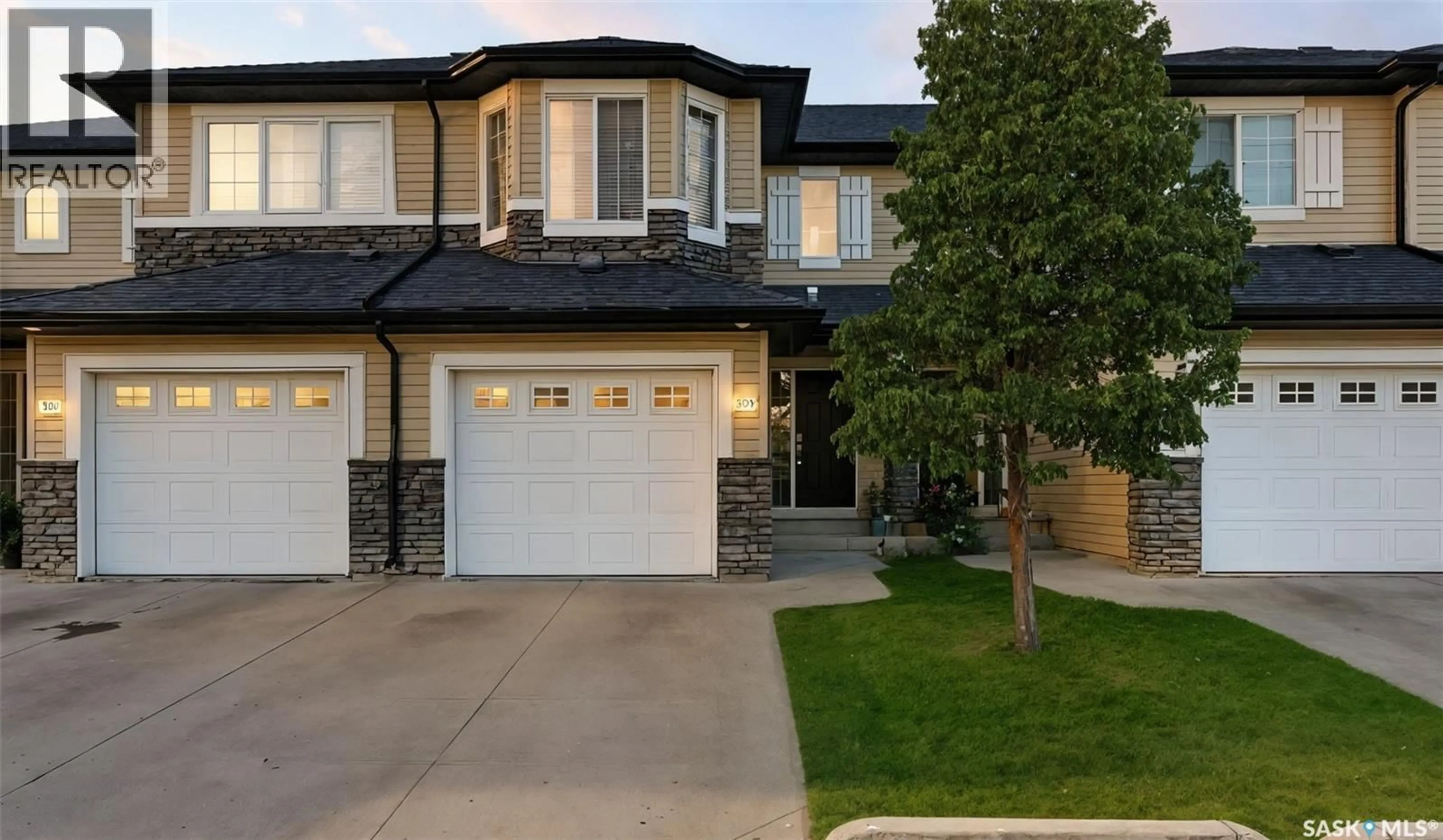 Home with vinyl exterior material, street for 308 - 410 LEDINGHAM WAY, Saskatoon Saskatchewan S7V0C4