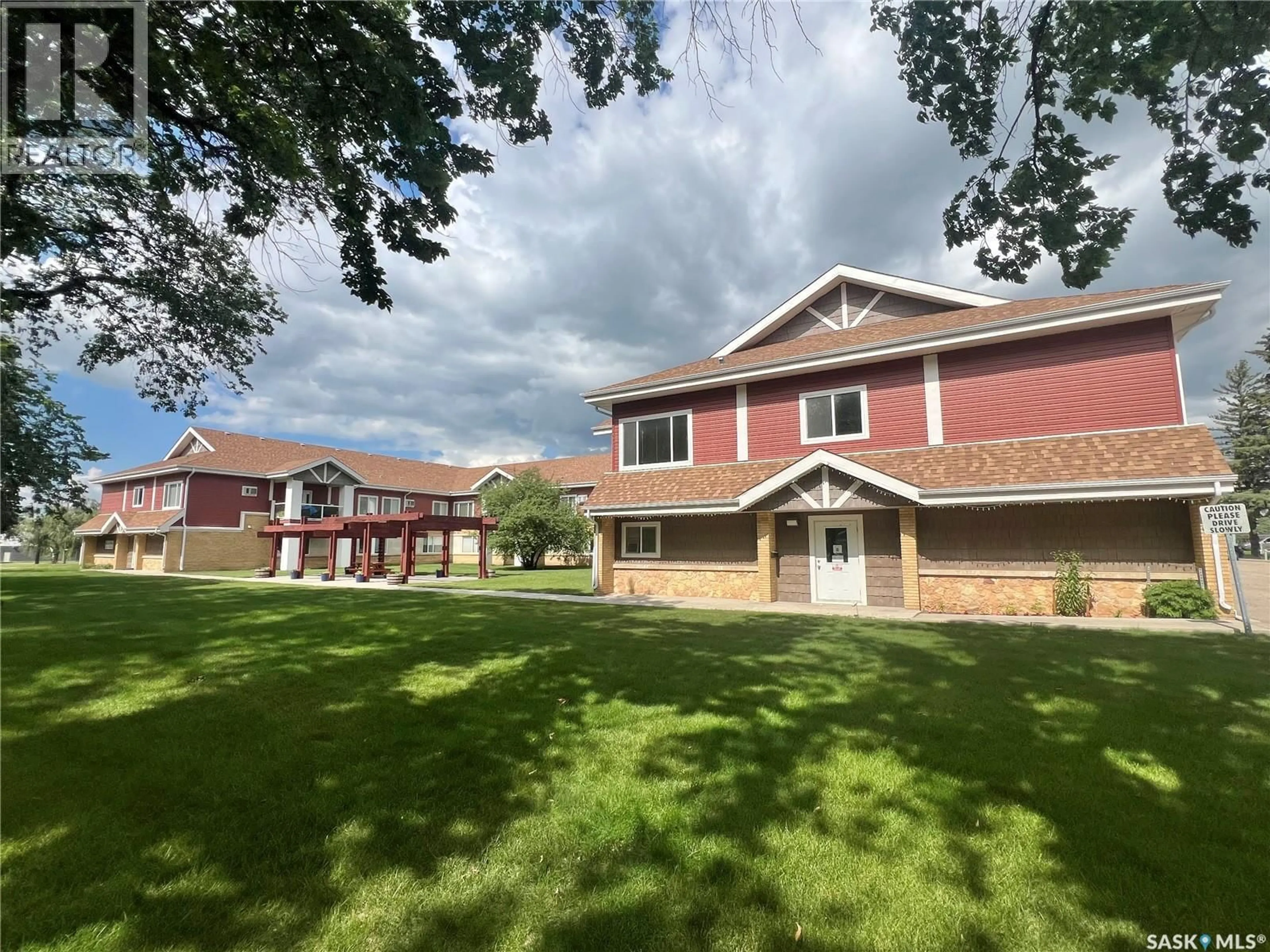 A pic from outside/outdoor area/front of a property/back of a property/a pic from drone, unknown for 302 - 114 BEMISTER AVENUE E, Melfort Saskatchewan S0E1A0