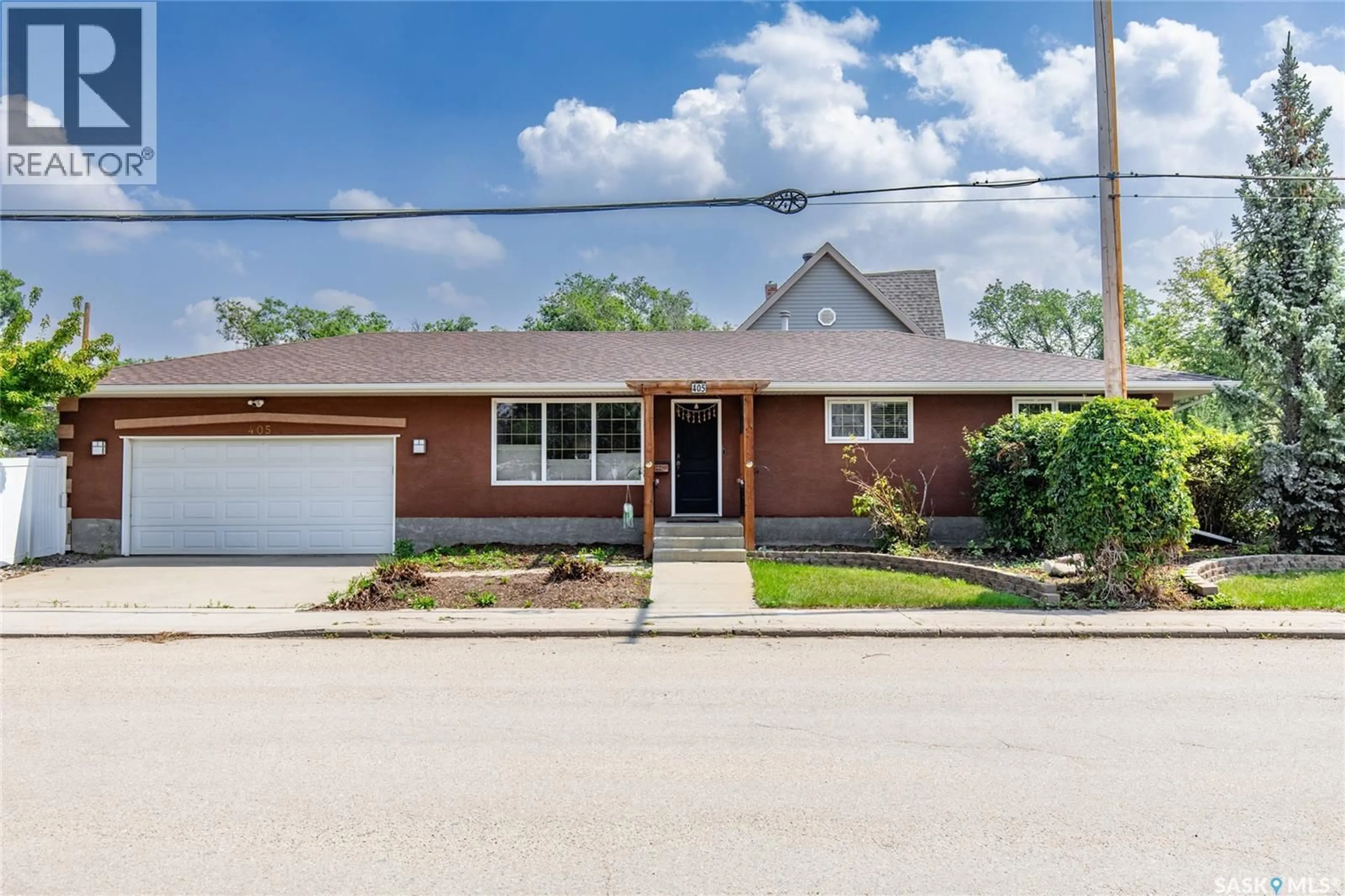 Home with brick exterior material, street for NE - 405 4TH AVENUE, Moose Jaw Saskatchewan S6H8B8