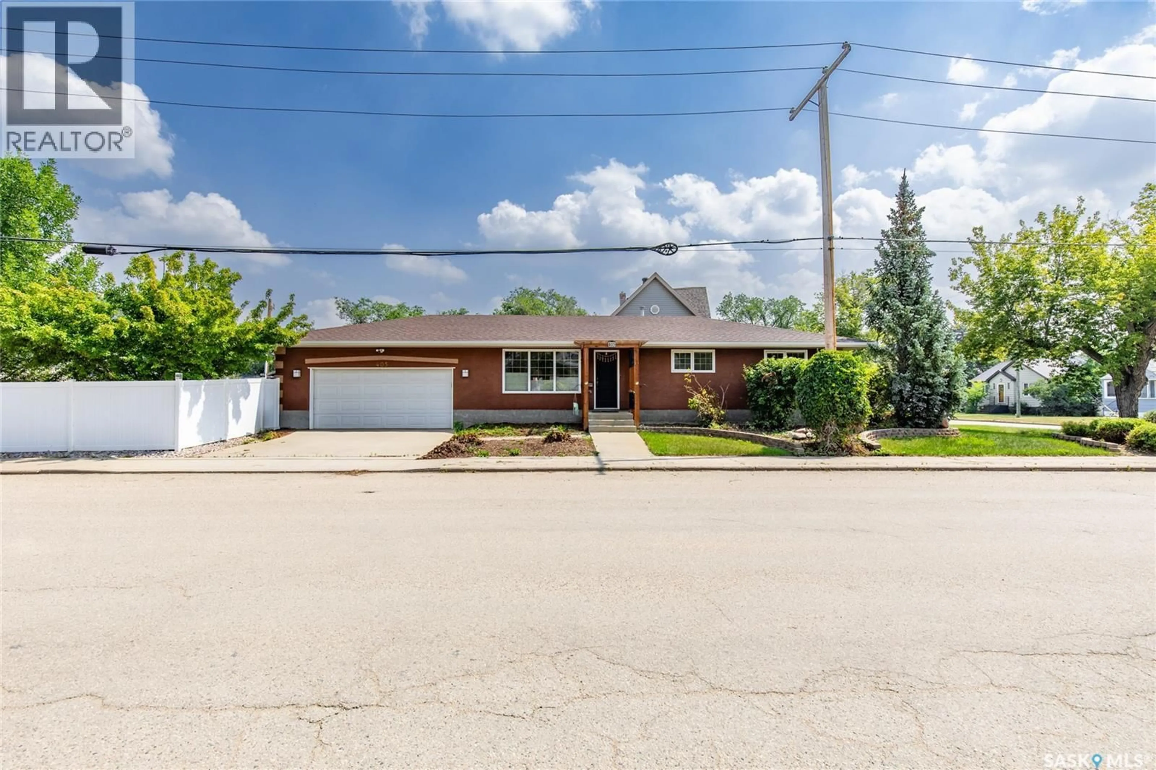 Home with brick exterior material, street for NE - 405 4TH AVENUE, Moose Jaw Saskatchewan S6H8B8