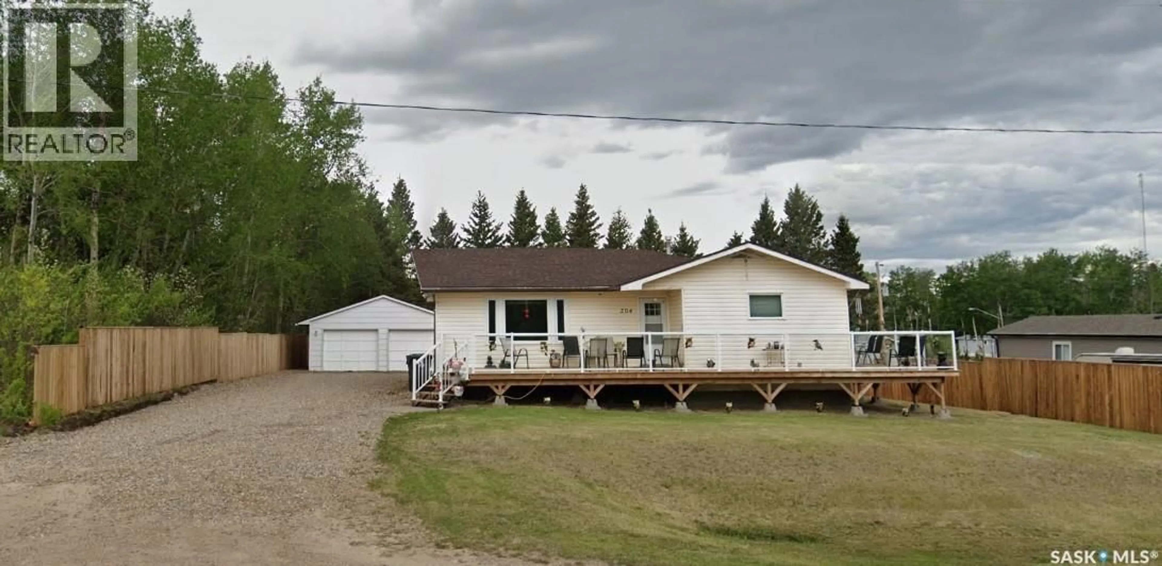 Home with vinyl exterior material, street for 204 1ST AVENUE, Dorintosh Saskatchewan S0M0T0